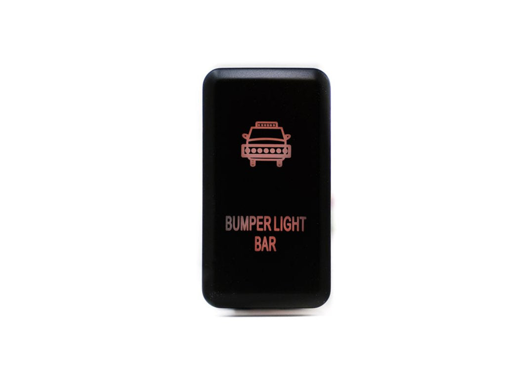 Black bumper light bar switch with amber icon for off-road vehicle accessories