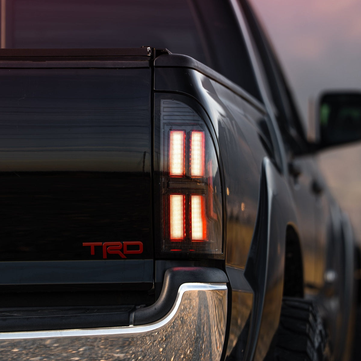 AlphaRex NOVA-Series Prismatic LED Tail Lights for Toyota Tacoma - Black Smoke