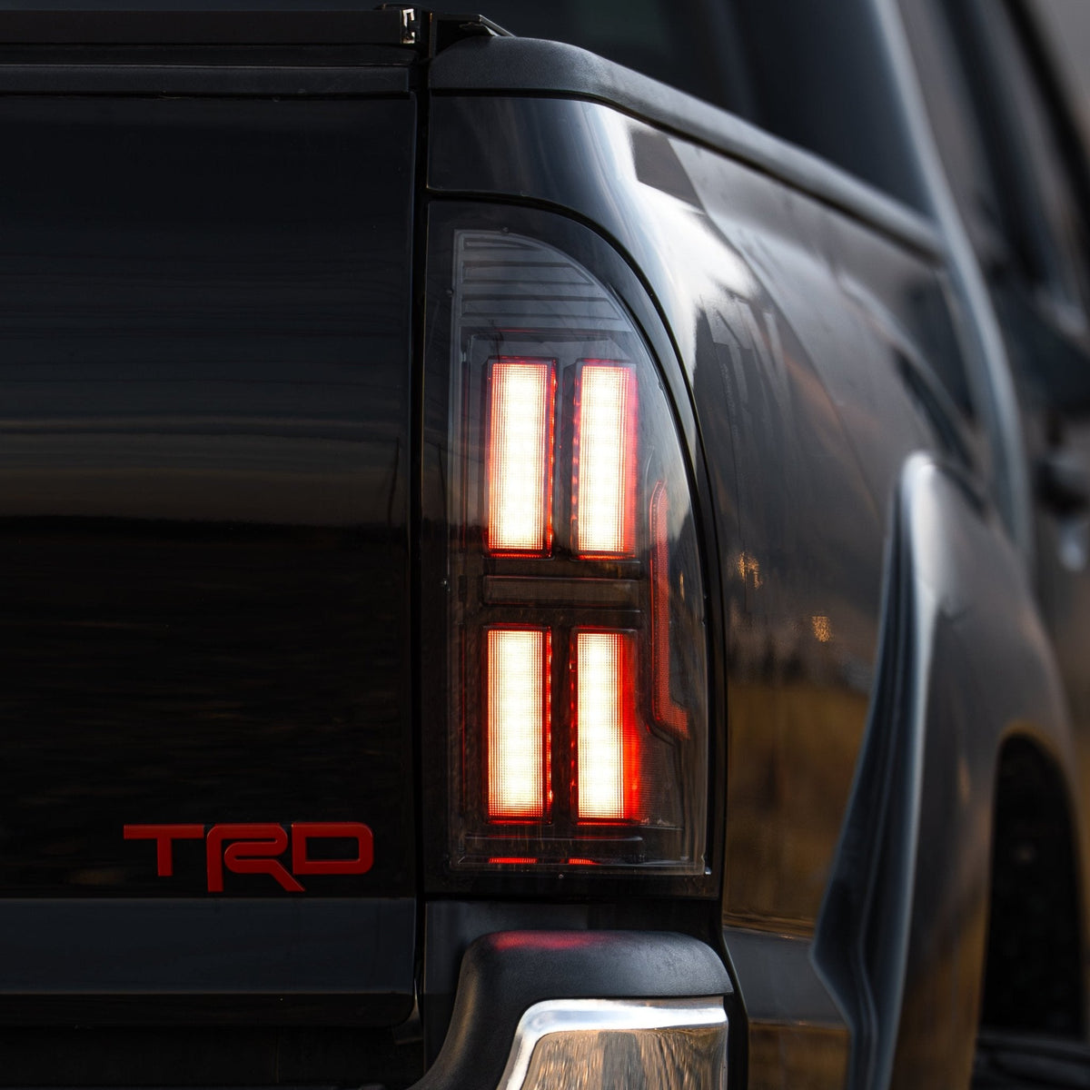 AlphaRex NOVA-Series Prismatic LED Tail Lights for Toyota Tacoma - Black Smoke