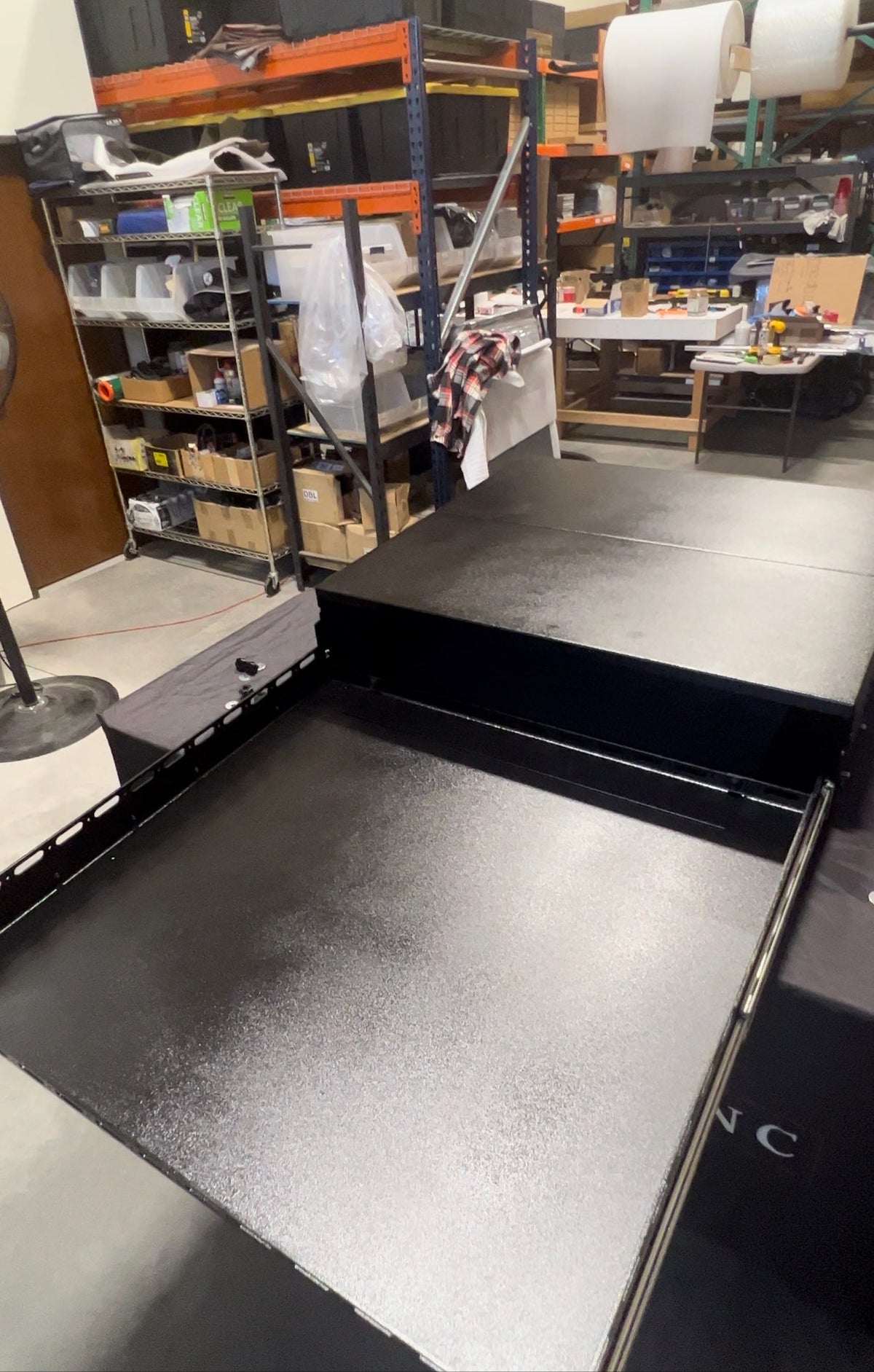 Diabolical Inc Clyde slide floor installed in a Bronco 2-door