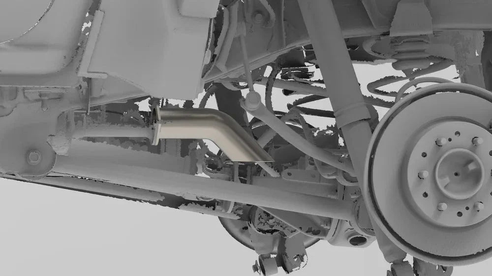 Undercarriage view of off-road vehicle suspension, exhaust system, and rear axle detail