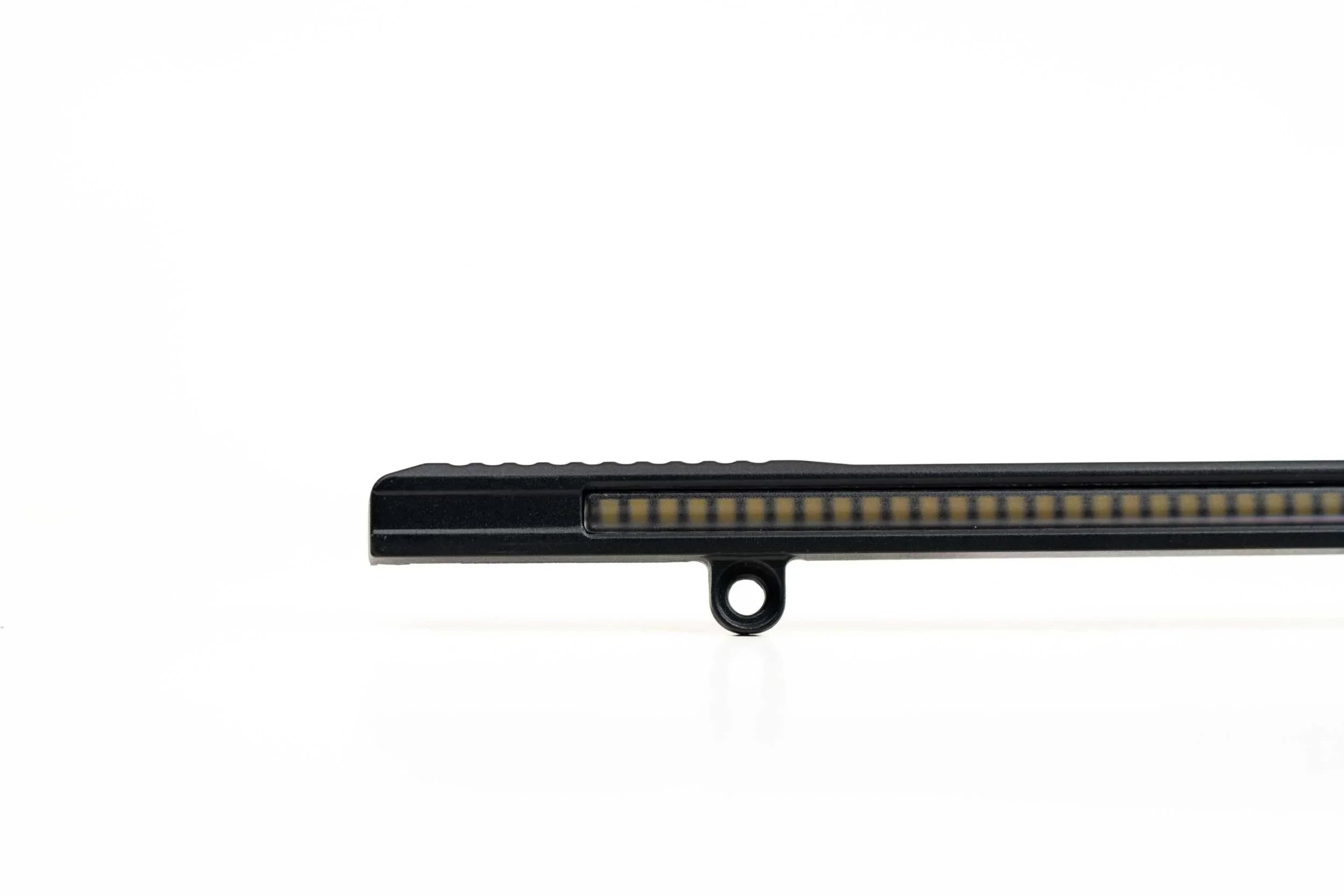 Close-up of slim LED light bar for overlanding vehicles on white background