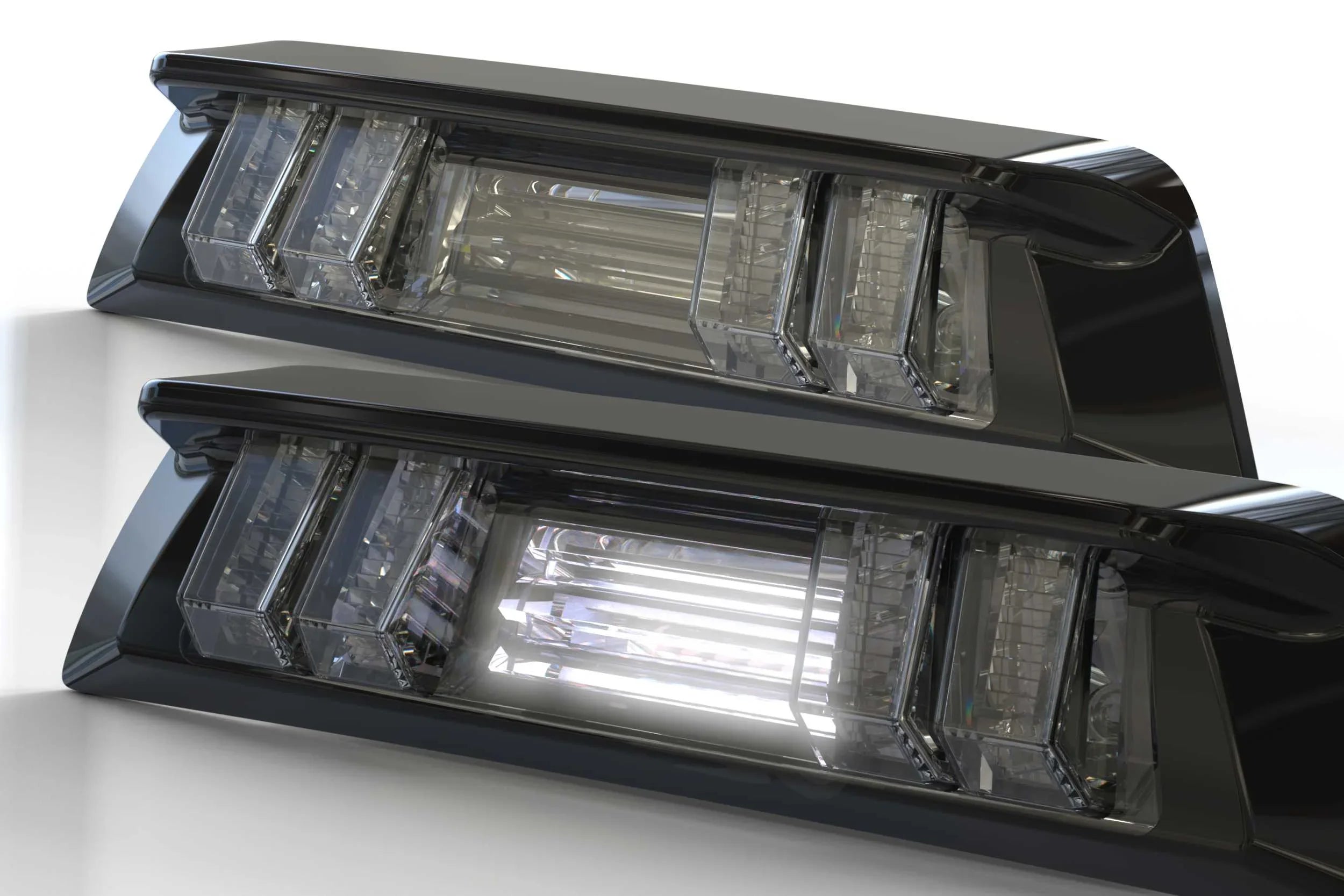 Pair of clear LED tail lights for Toyota Tacoma, modern automotive accessory close-up