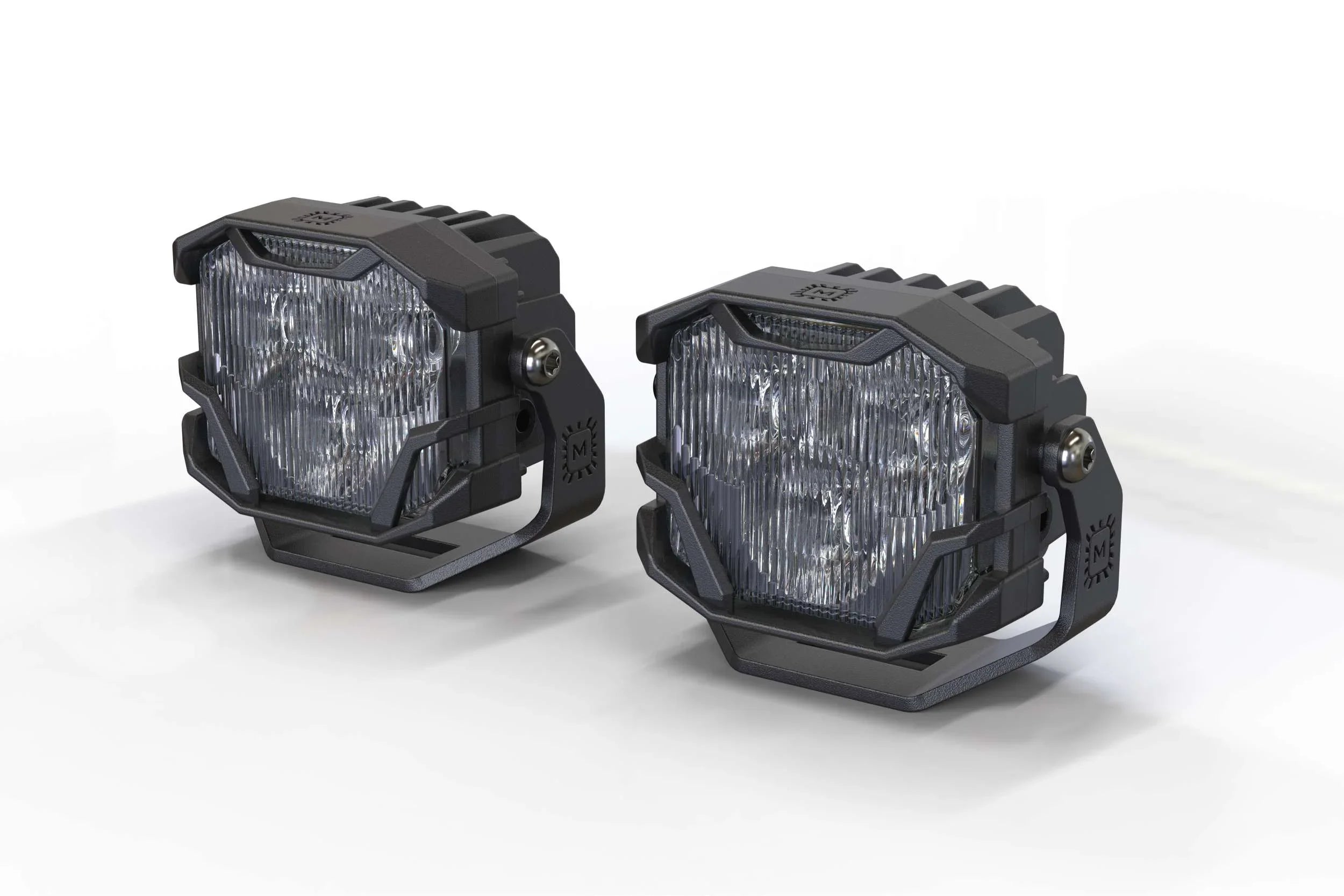 Pair of rugged LED off-road pod lights with protective black housings on white background
