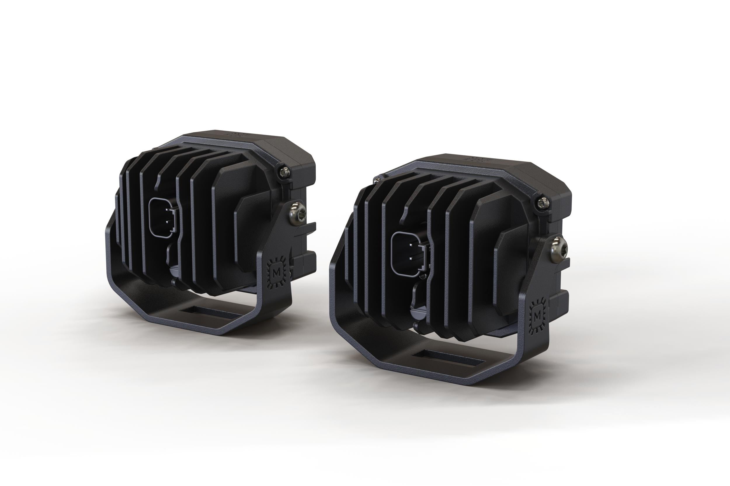 Pair of black off-road LED pod work lights with rugged heat sink, suited for trucks or SUVs