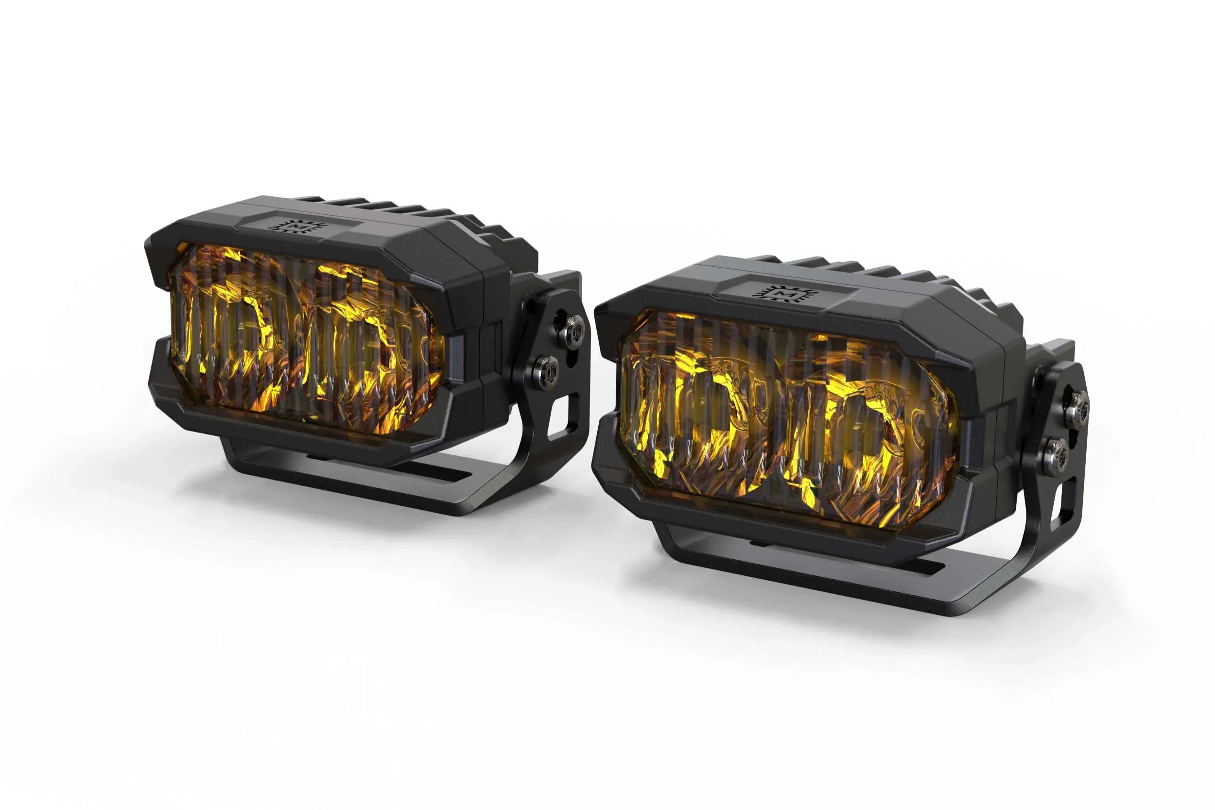 Pair of amber LED off-road fog lights with black housings on white background