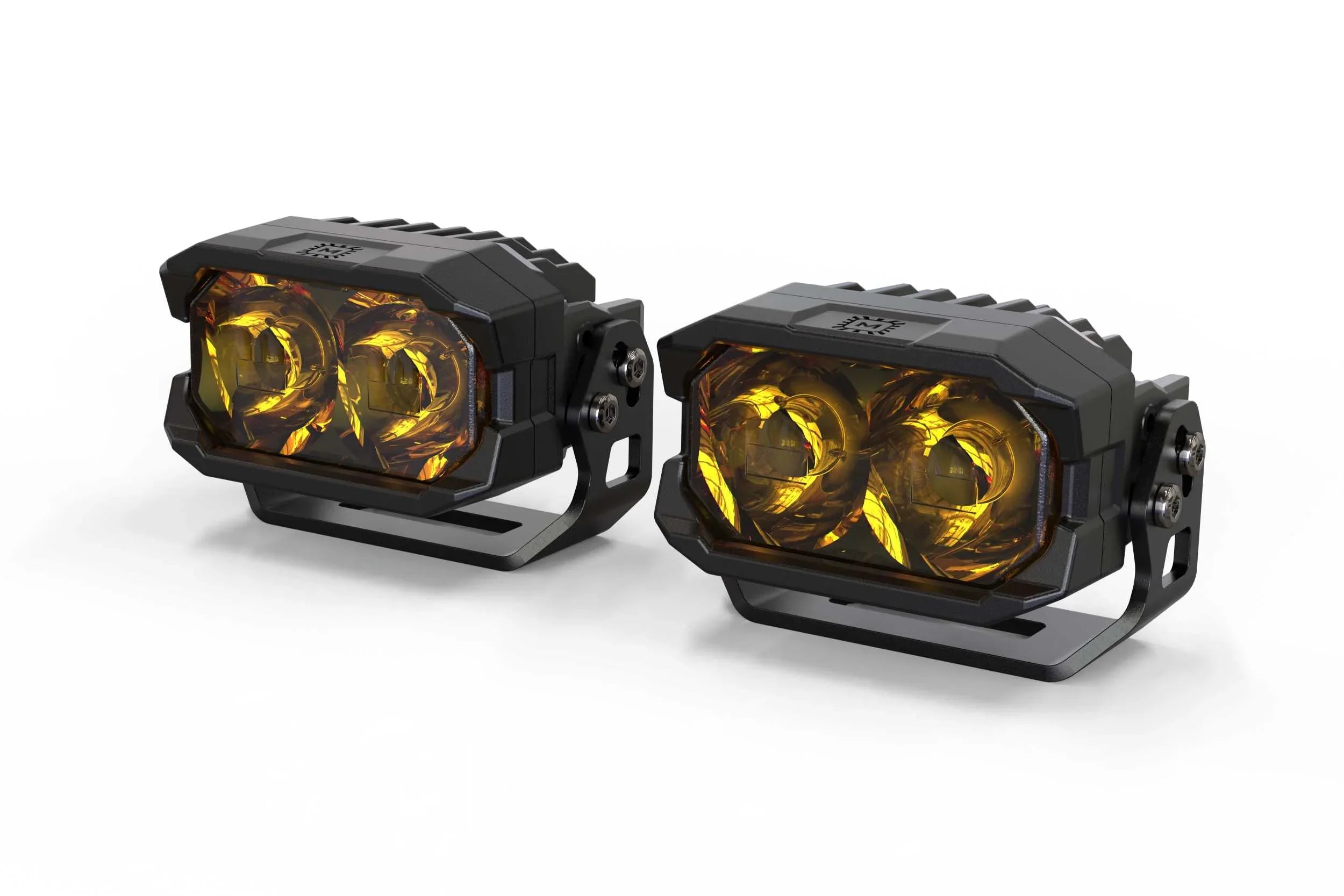 Pair of yellow lens LED pod lights for off-road or overlanding vehicles on white background