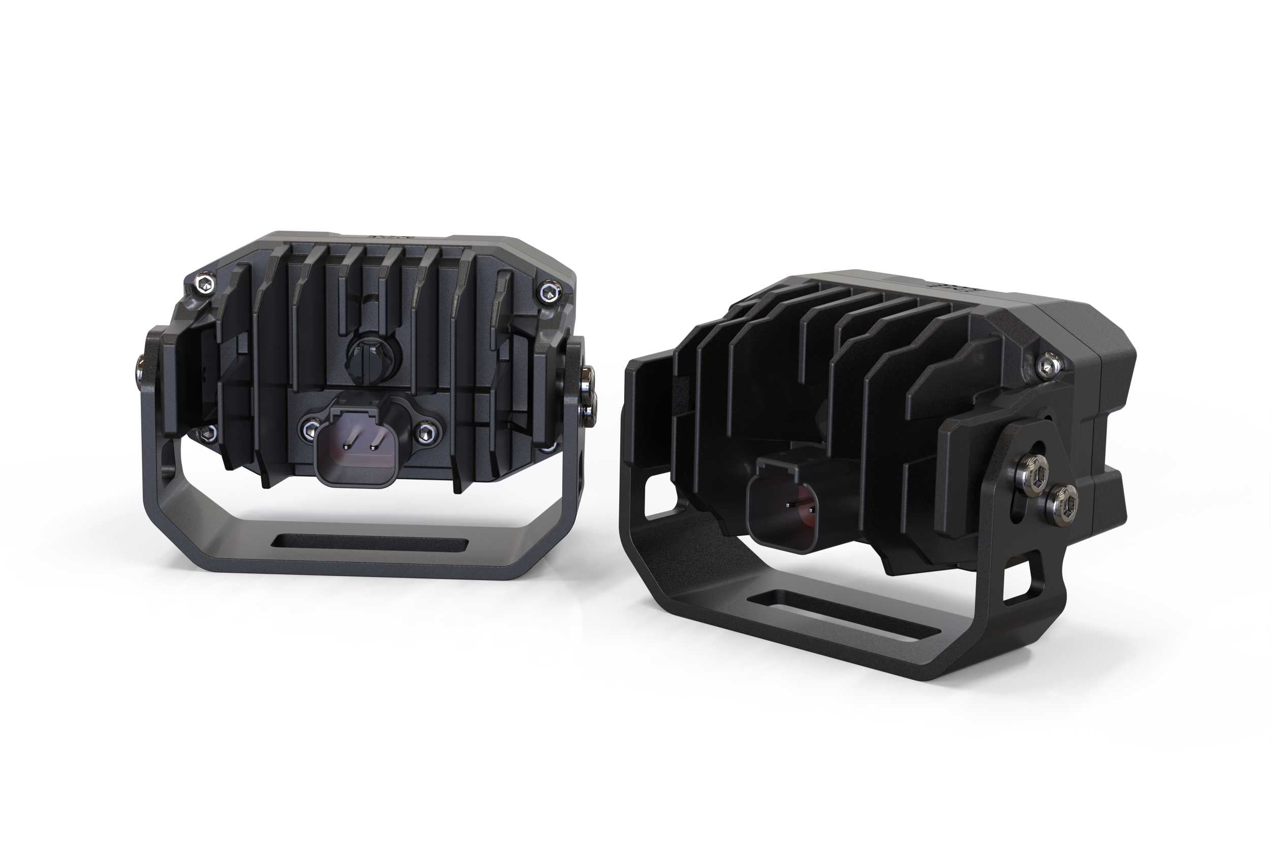 Heavy-duty LED off-road pod lights with cooling fins and mounting brackets, isolated on white.