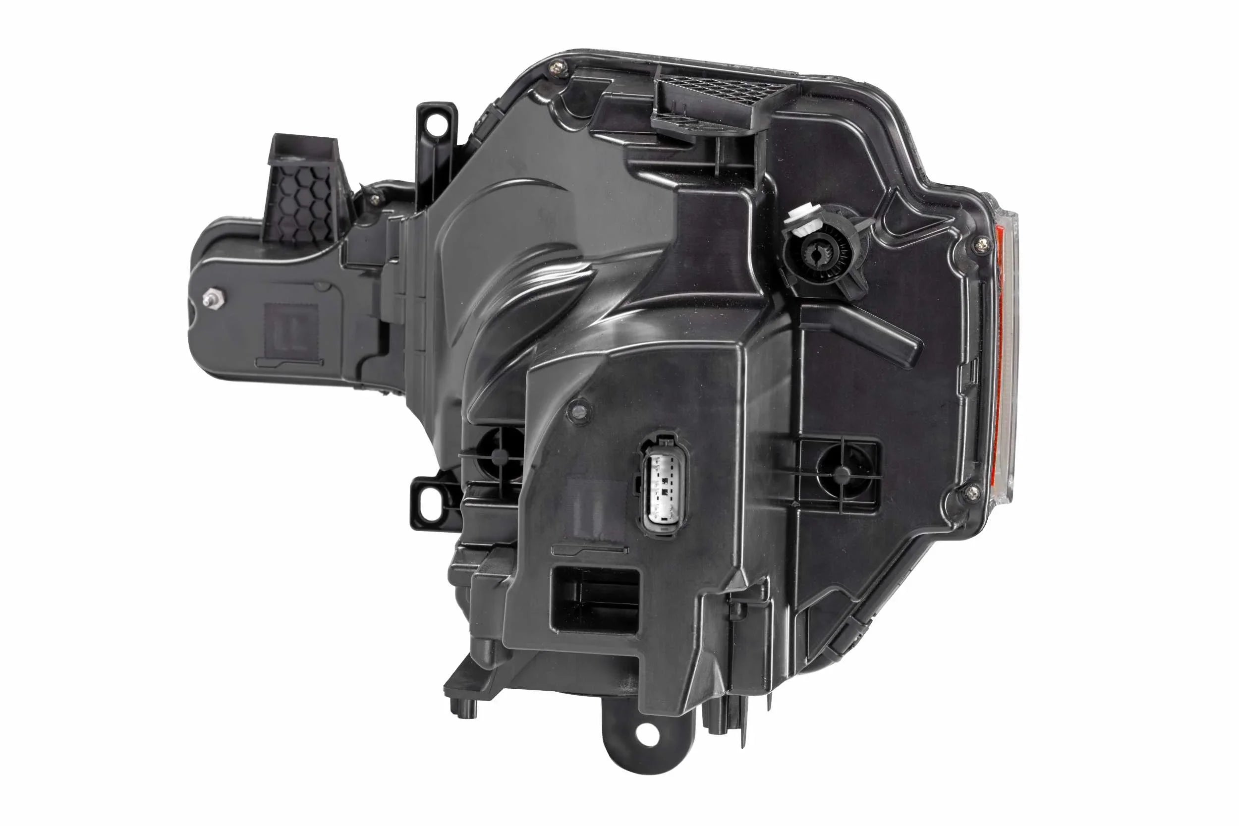 Close-up of black automotive headlight housing with wiring connector for off-road vehicle