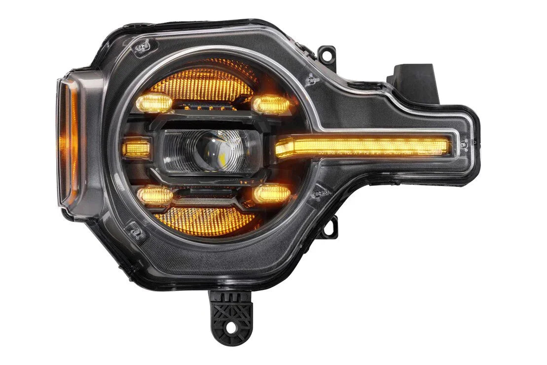 LED projector headlight with amber accents for Toyota Tacoma or overlanding vehicles