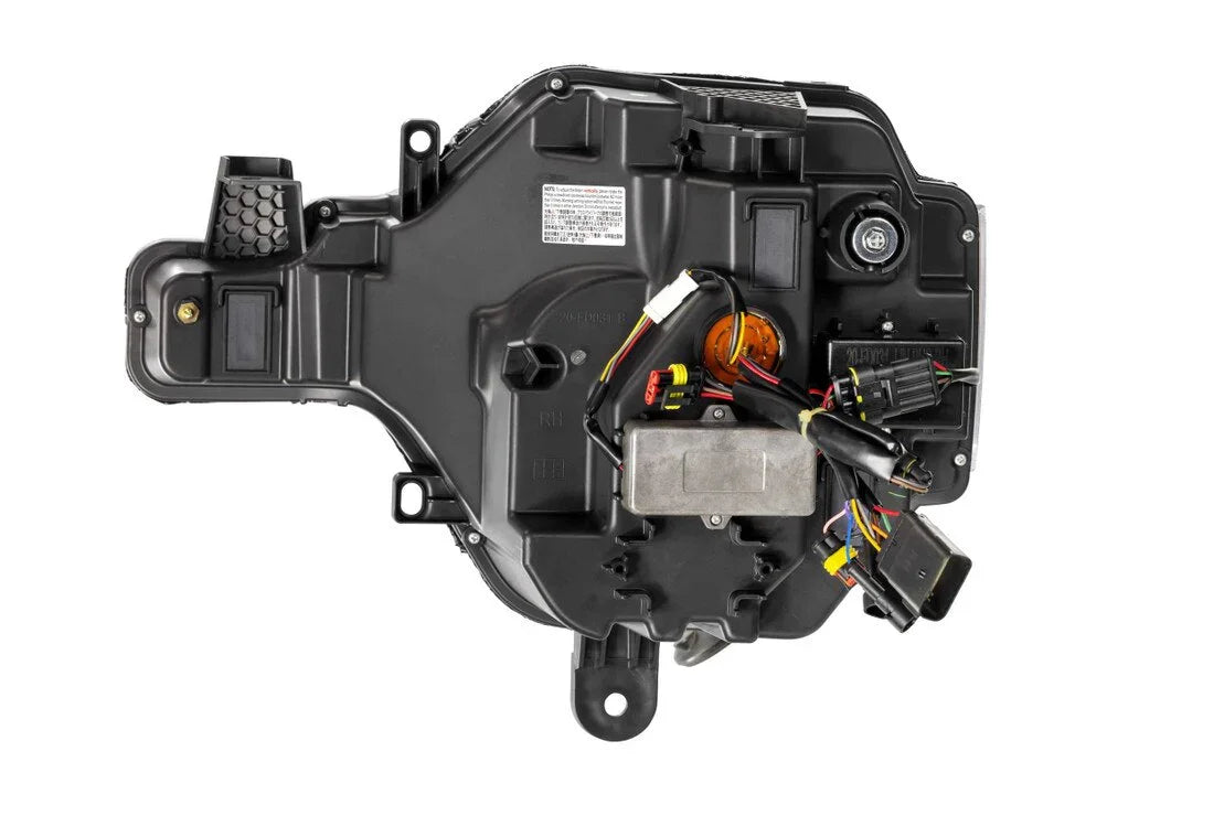 Automotive headlight assembly with wiring harness for off-road vehicle or truck