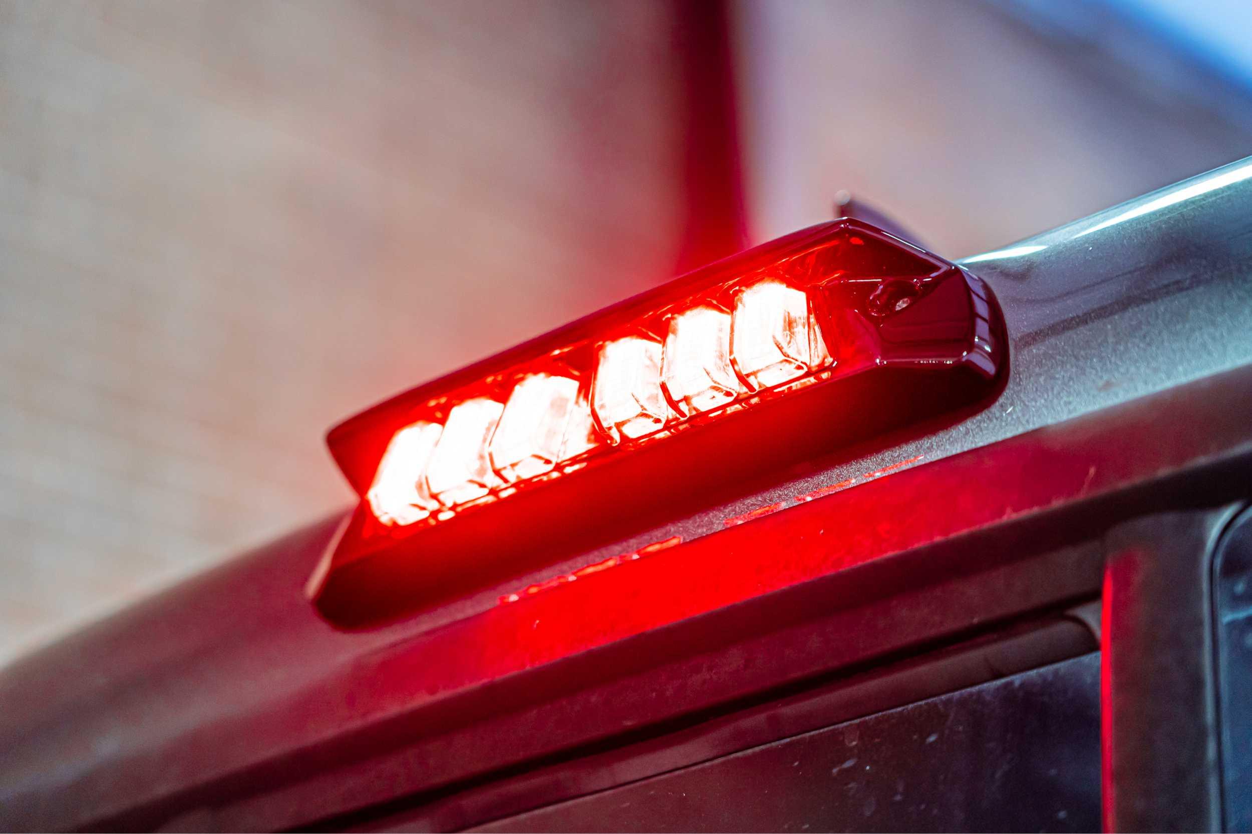 LED third brake light illuminated on vehicle roof, overlanding and off-road accessory