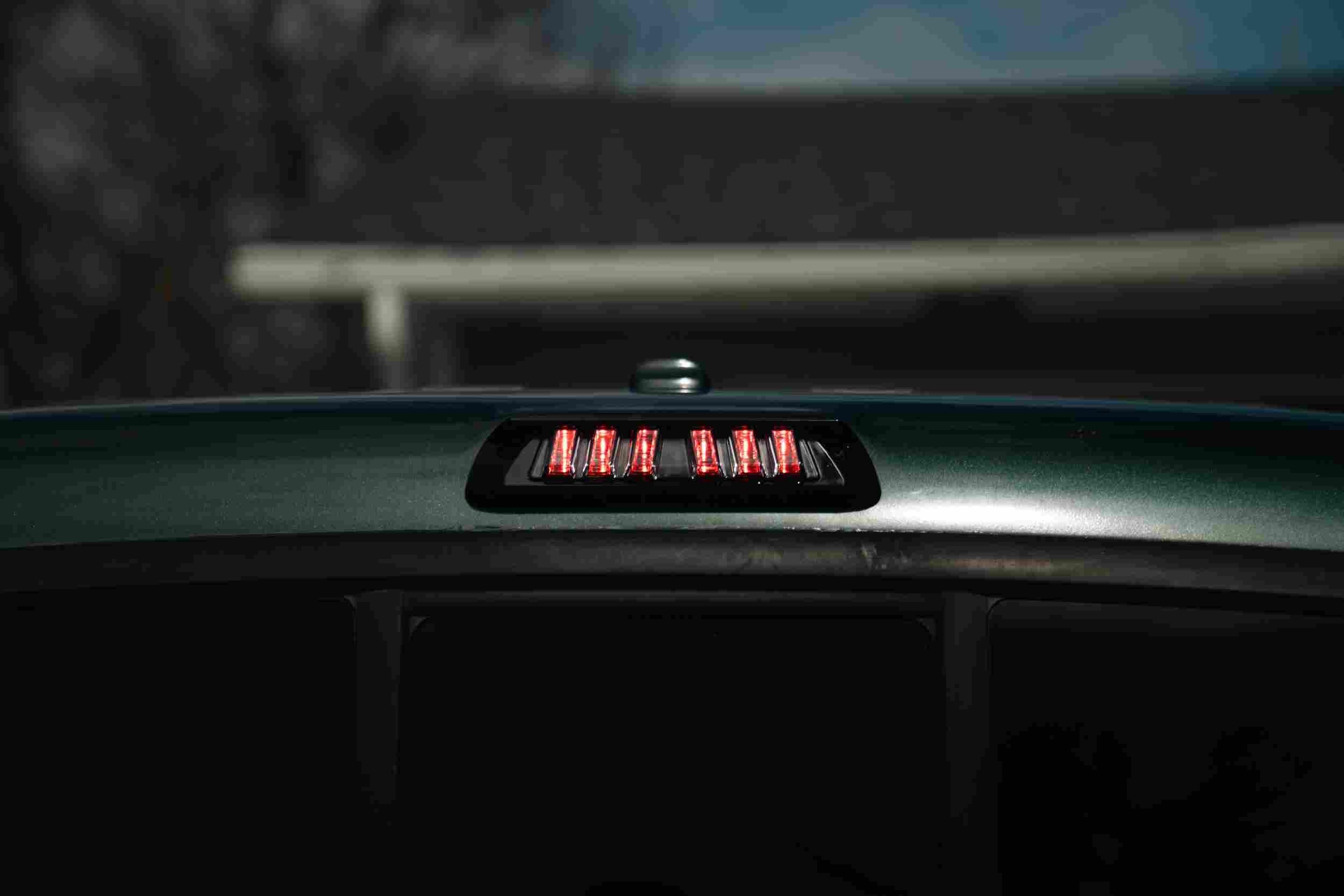 Close-up of an LED third brake light on a truck, highlighting vehicle accessory for overlanding.
