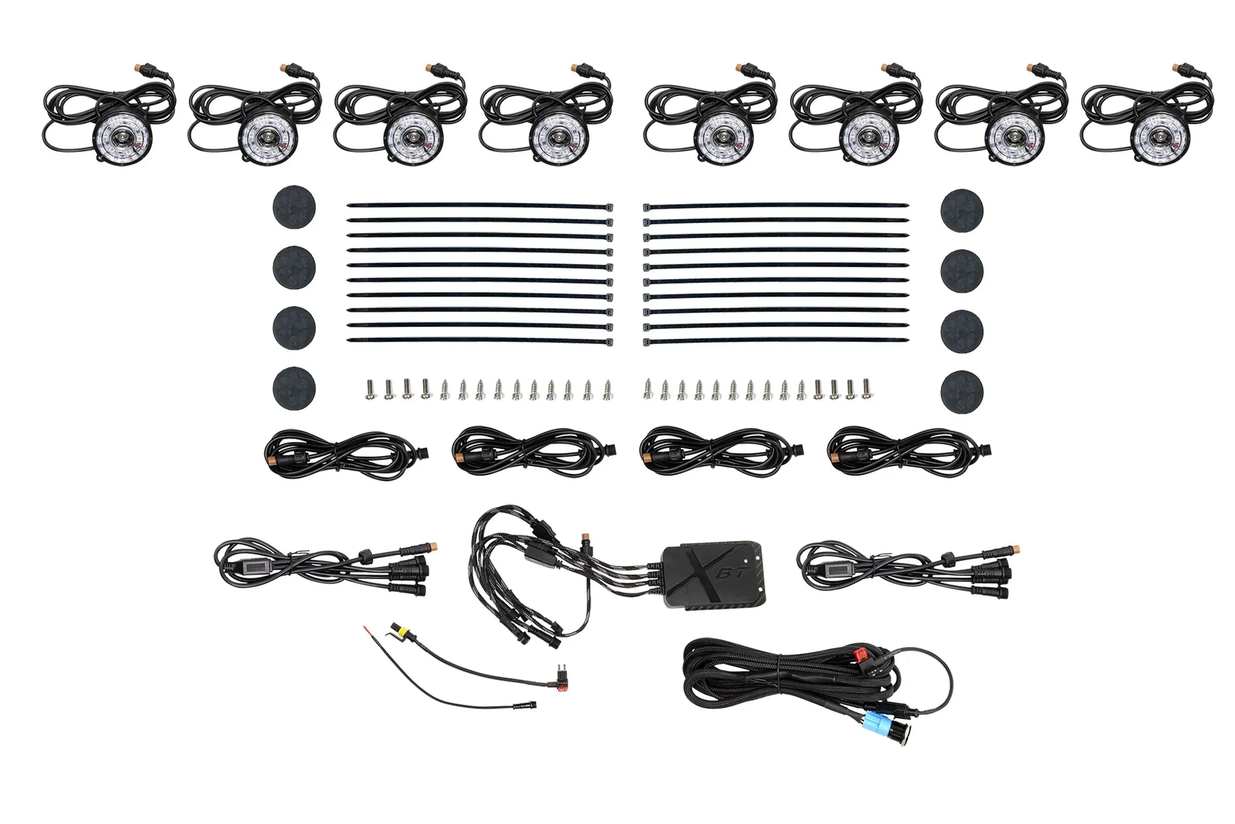LED rock light kit with lights, wiring, zip ties, mounting hardware, and connectors for off-road vehicles