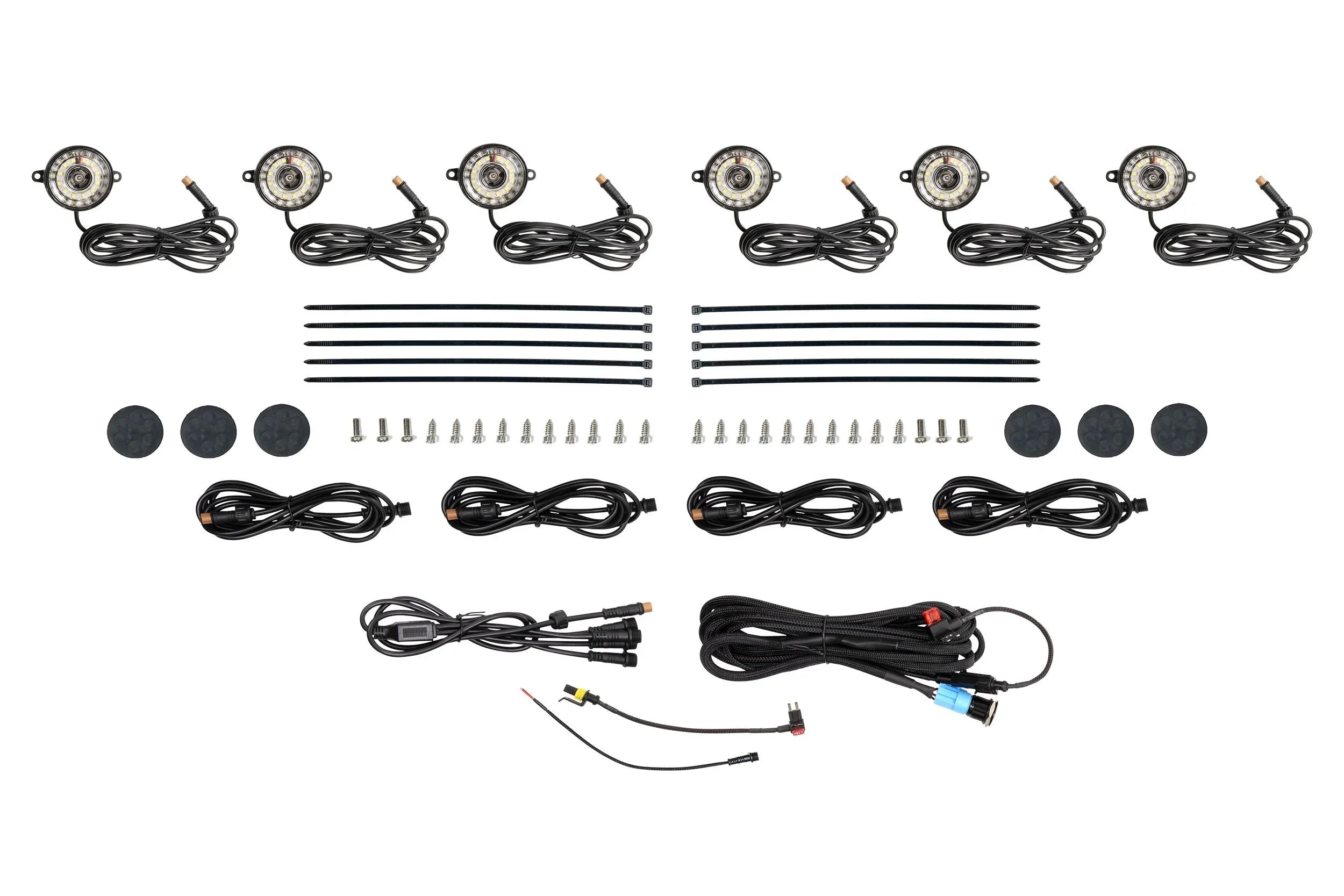 Off-road LED rock light kit with eight lights, wires, zip ties, and mounting hardware for vehicles