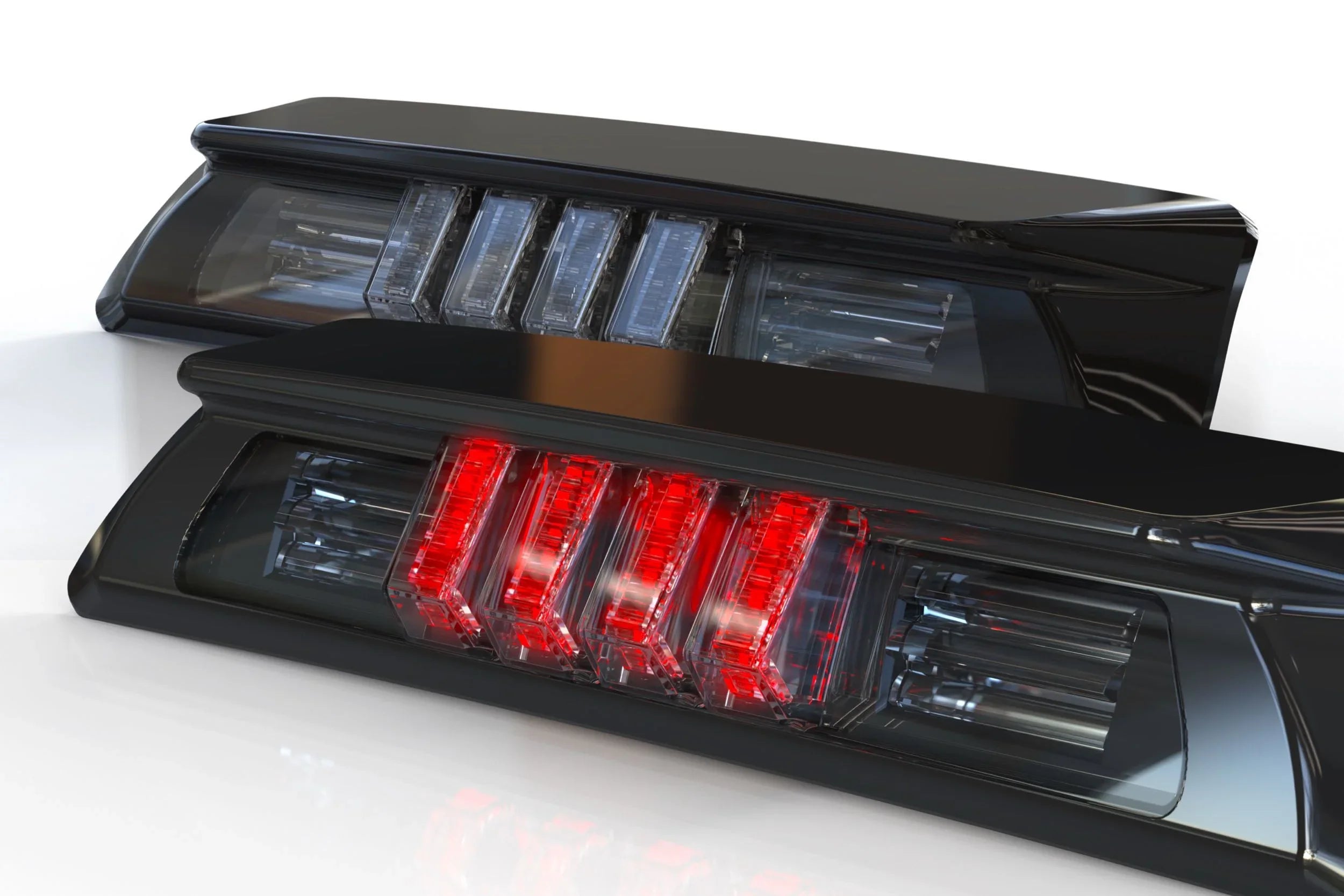 Pair of modern LED truck tail lights with black housing and red illuminated bars