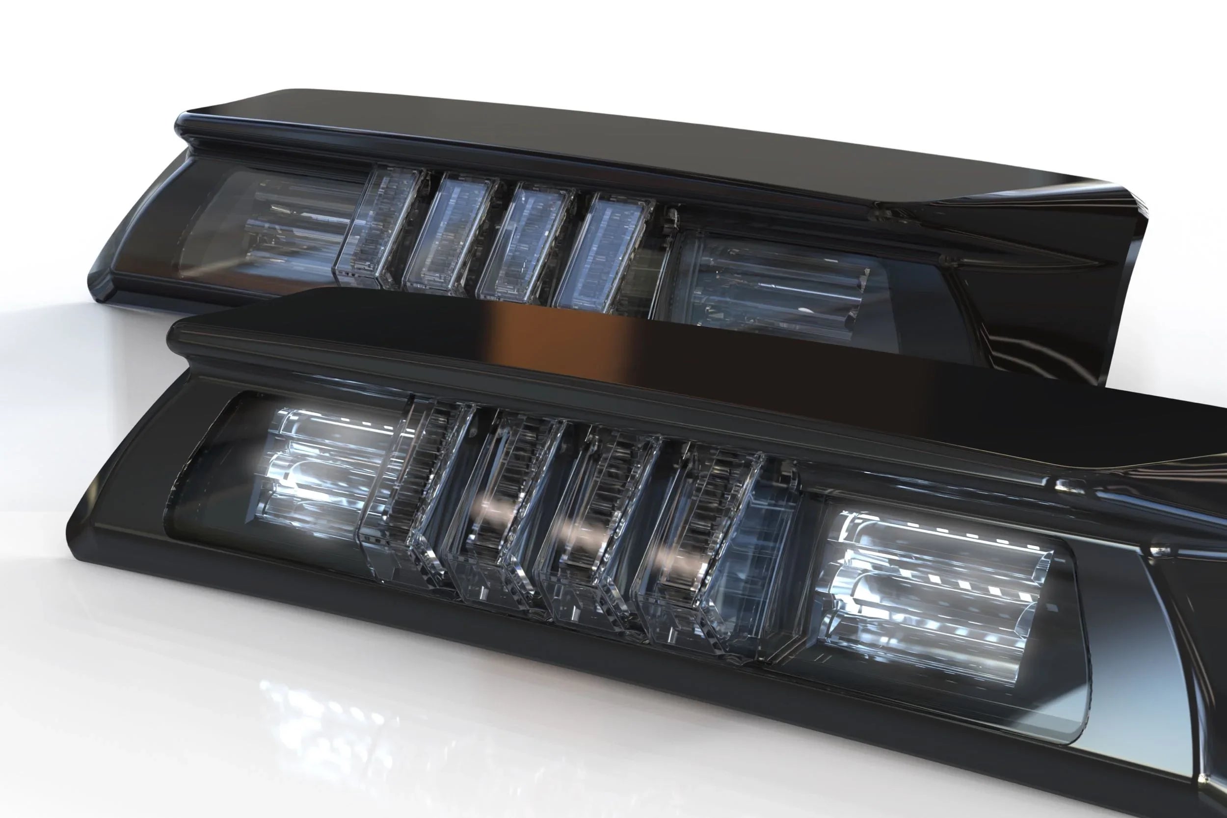 Pair of smoked LED cab lights for Toyota Tacoma, close-up on clear lens design