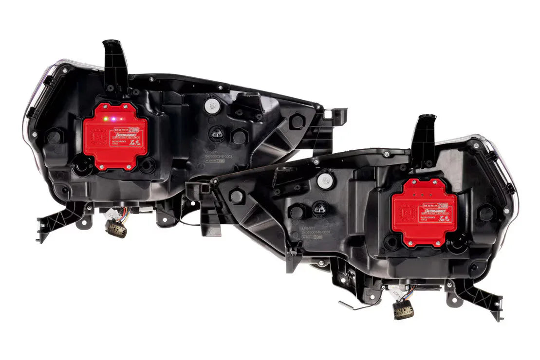 Pair of aftermarket LED headlight assemblies with red control modules for trucks or SUVs