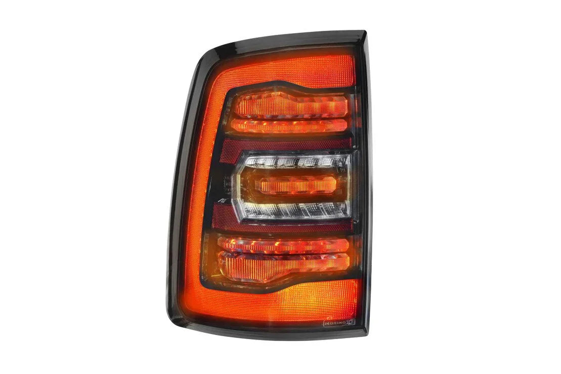 LED tail light for Dodge Ram truck, black housing with red and amber accents