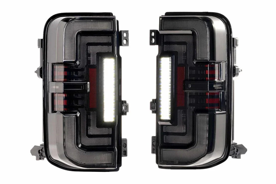 Pair of black LED tail lights with clear lenses for Toyota Tacoma trucks