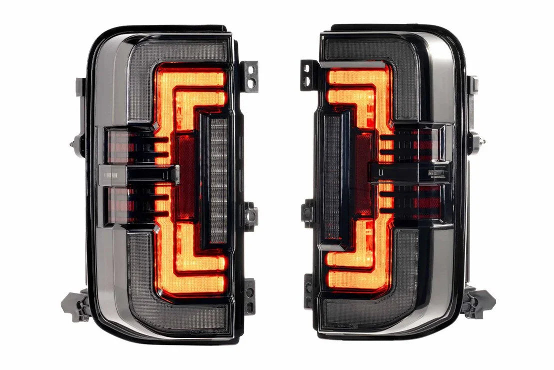 Pair of LED smoked tail lights with amber accents for off-road truck or SUV