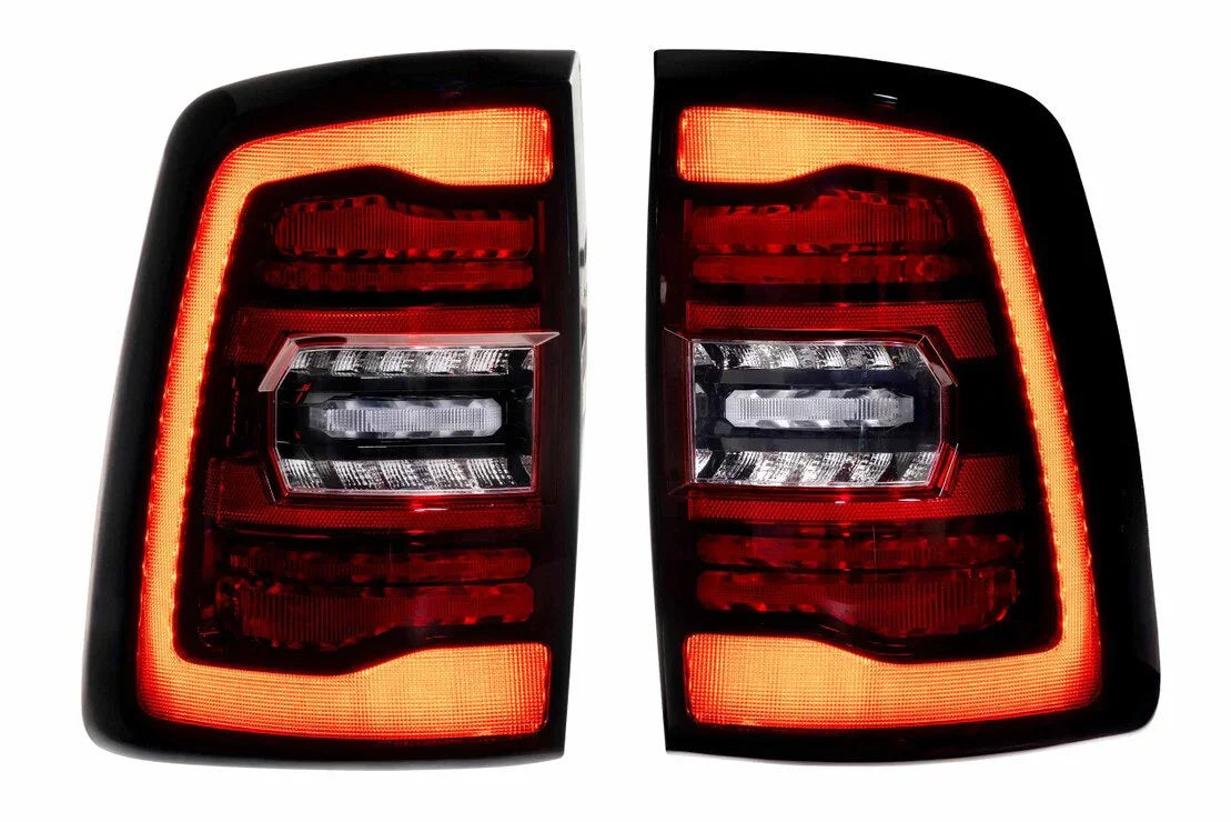 Pair of modern LED tail lights with red and clear housings for trucks or SUVs