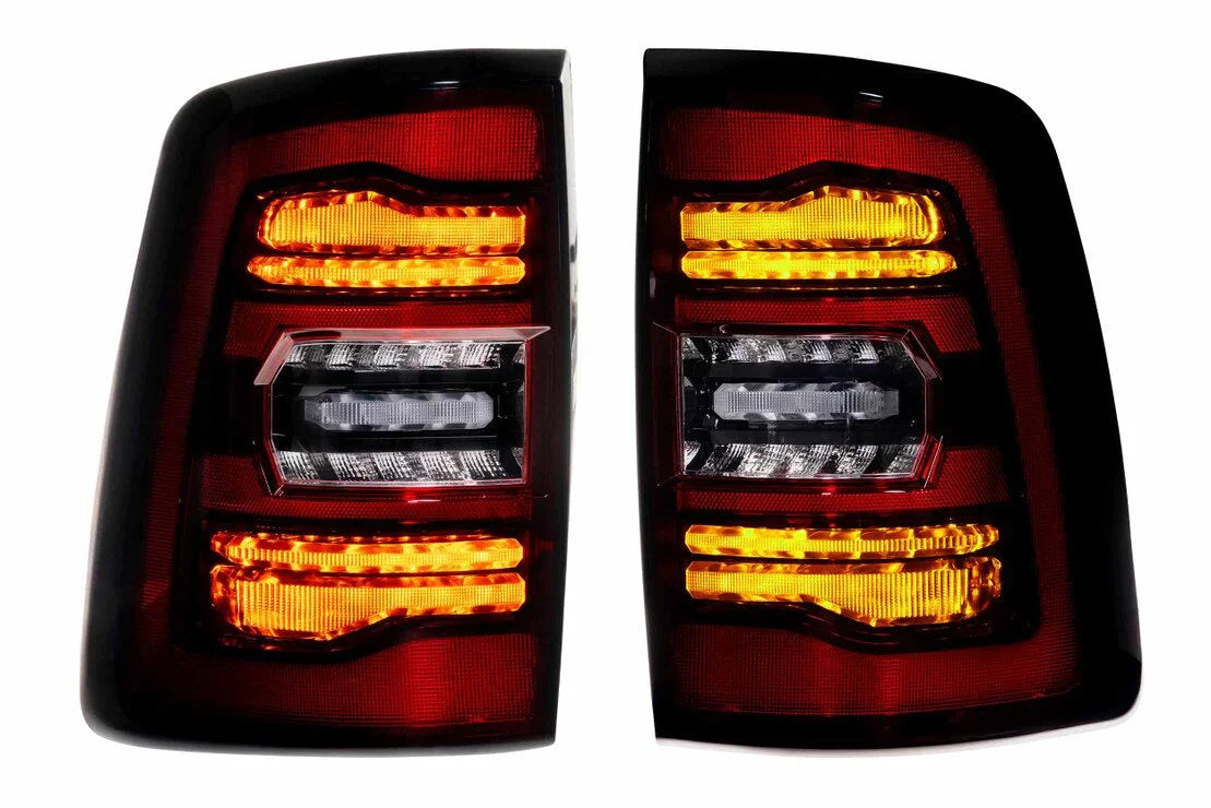 Pair of LED aftermarket tail lights with red and amber accents for off-road vehicles
