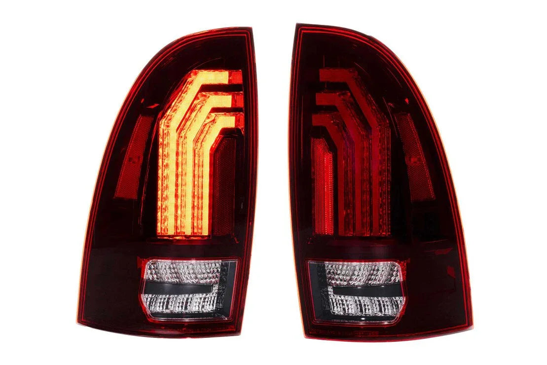 Pair of smoked LED tail lights with red and white accents for Toyota Tacoma