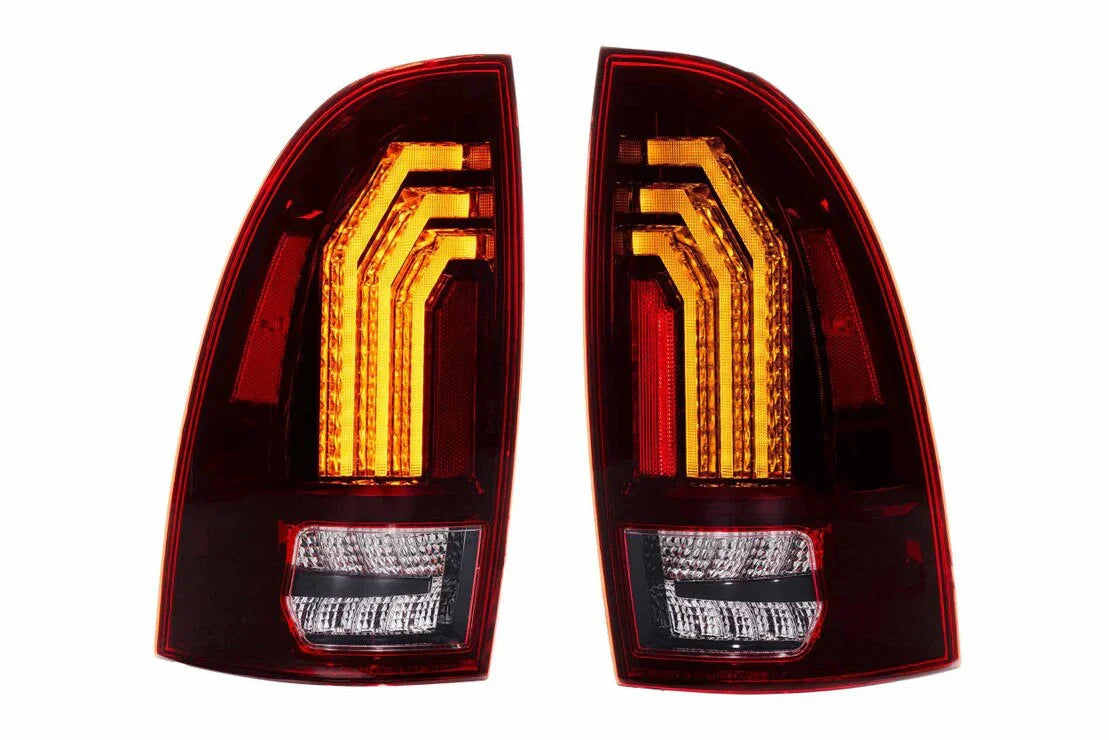 Pair of LED tail lights with amber and red signals for Toyota 4Runner, shown illuminated