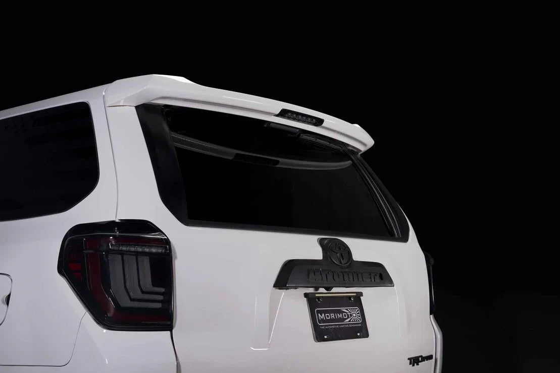 White Toyota 4Runner rear view with Morimoto LED tail lights and TRD Pro badge