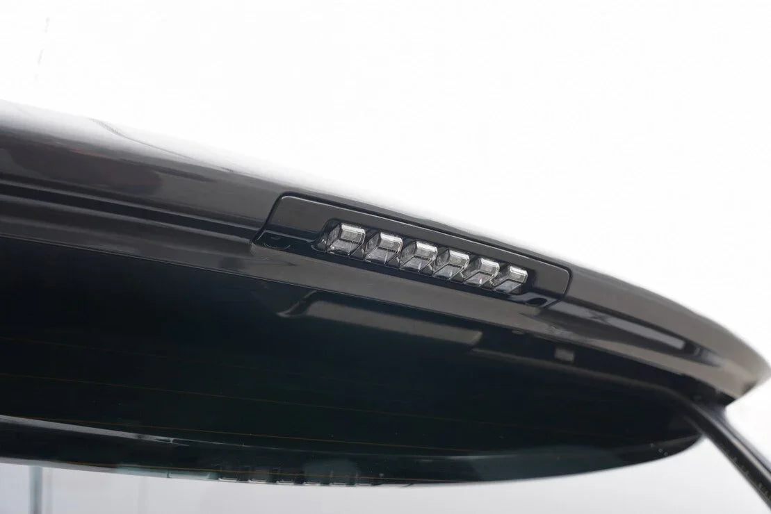 Close-up of an LED third brake light on a vehicle rear window, automotive accessory