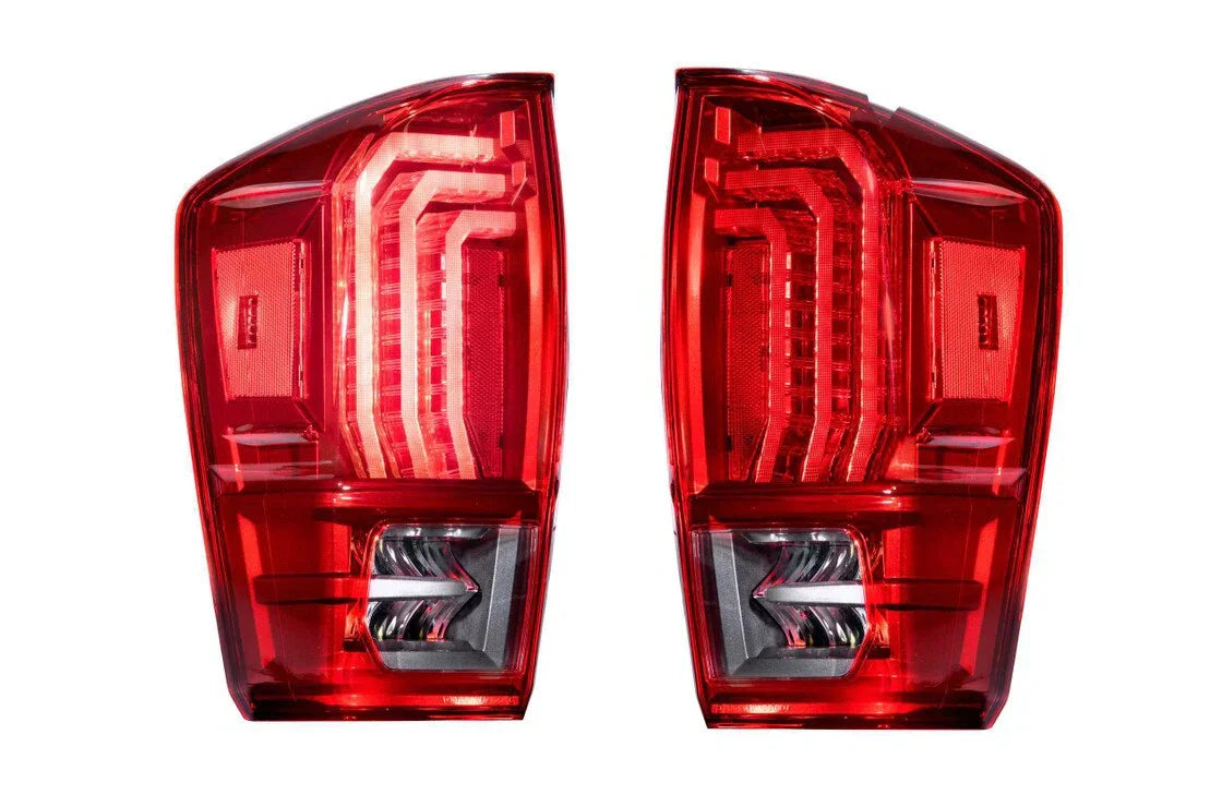 Pair of red LED tail lights for Toyota Tacoma, clear and modern overland truck accessory