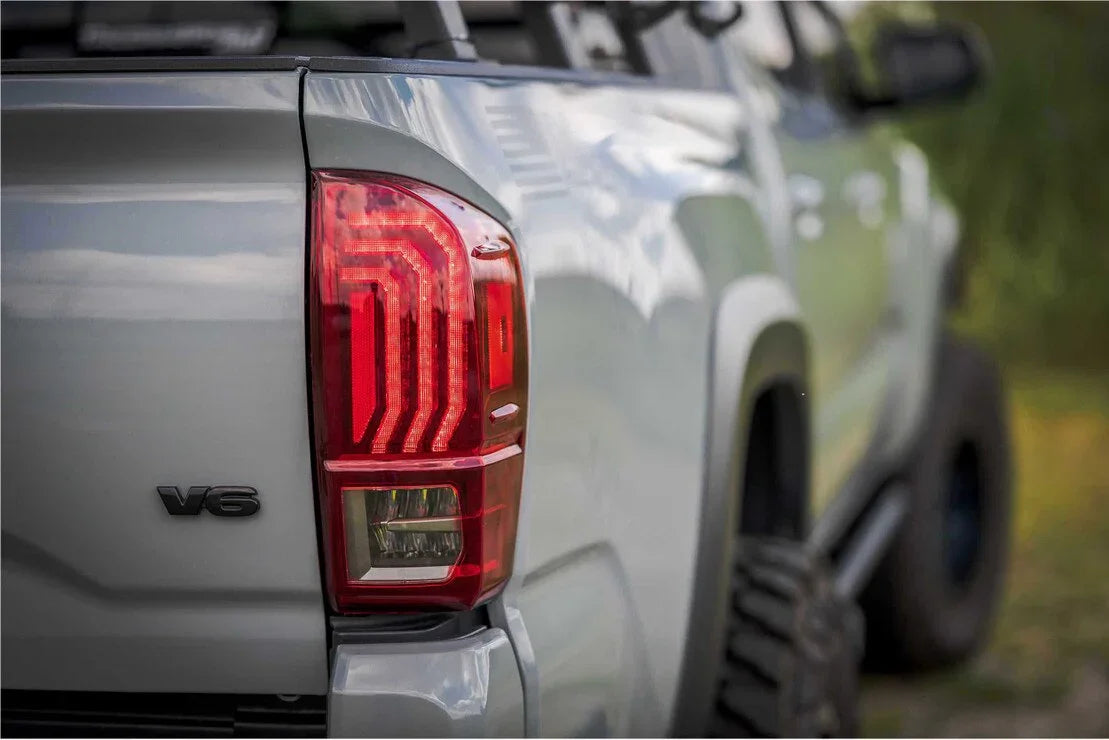 Close-up of Toyota Tacoma V6 LED tail light and rear fender outdoors