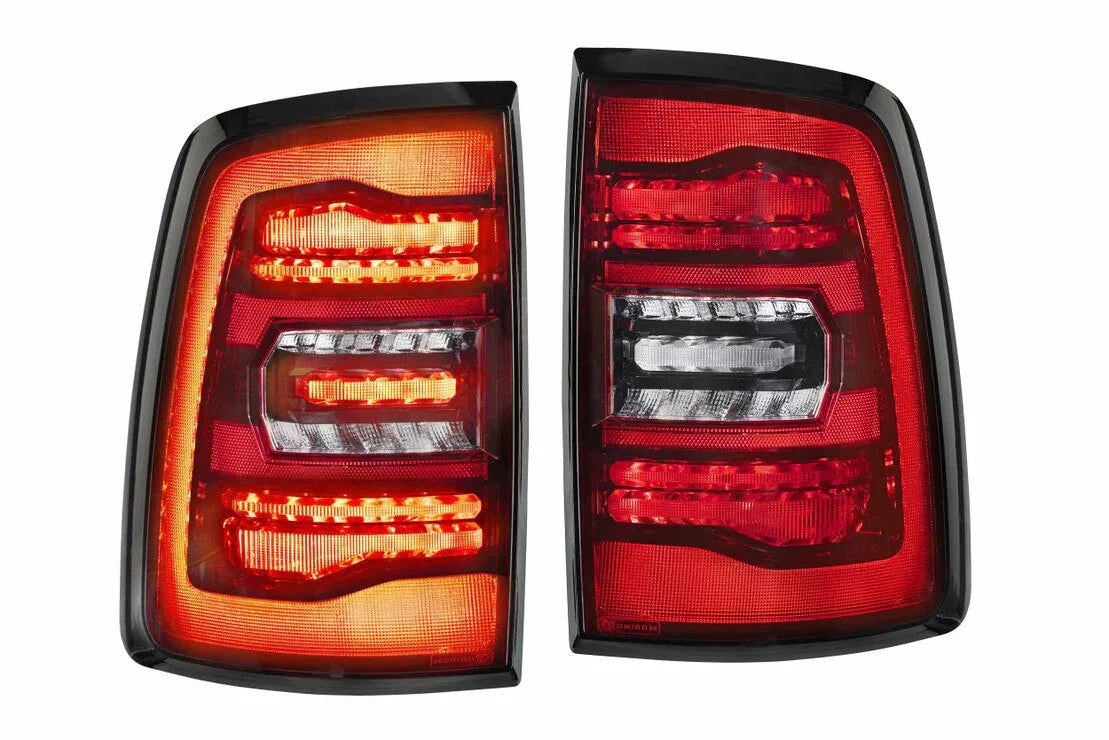 Pair of LED red taillights for Ram 1500 Classic truck, close-up on white background