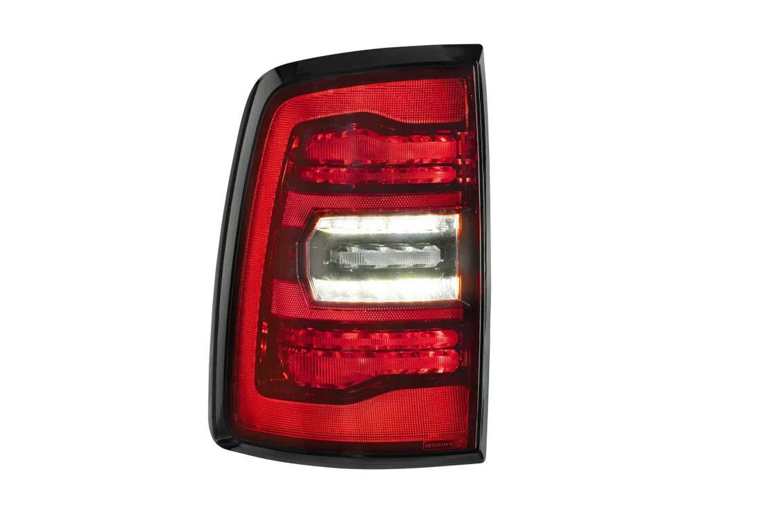 LED tail light assembly for Ram 1500 Classic, red lens with clear center section.