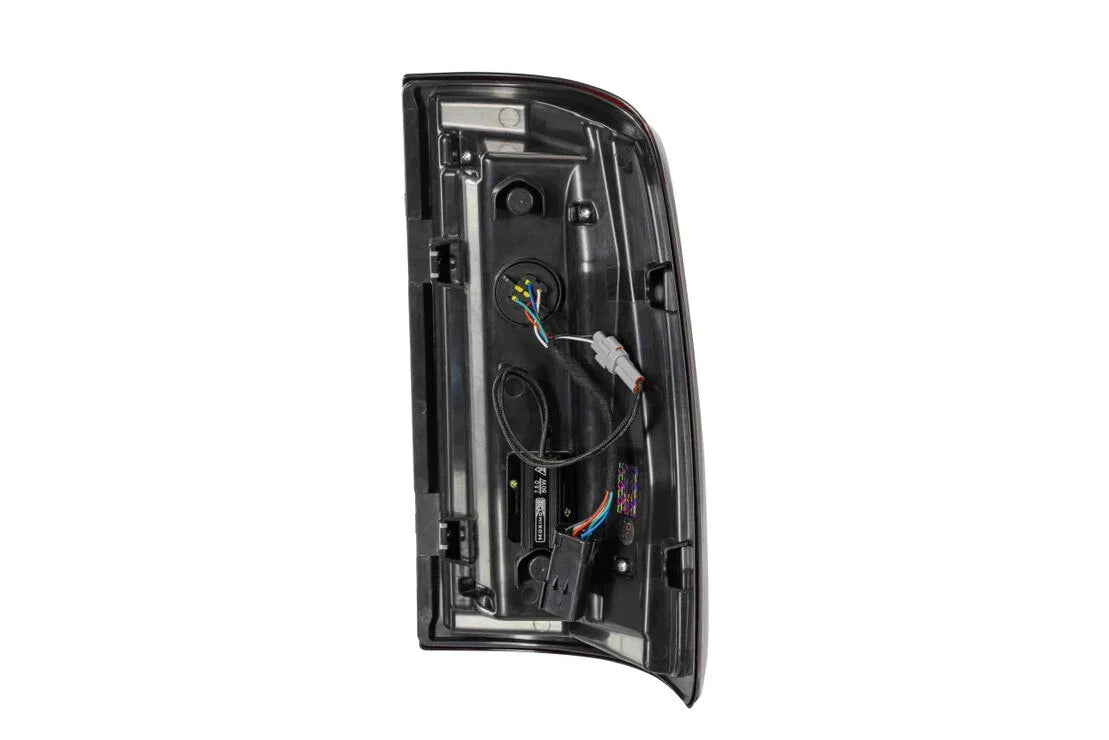 Back view of a truck tail light assembly with wiring and connectors visible