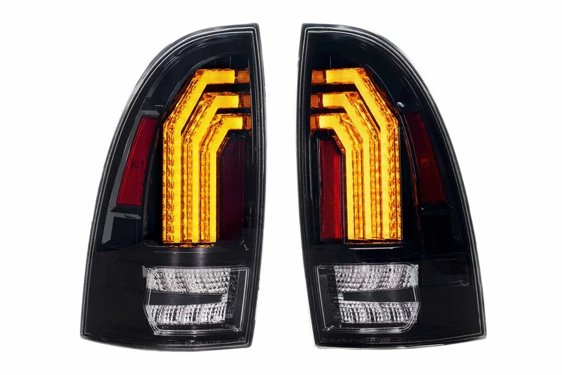 Pair of clear LED tail lights for Toyota Tacoma with amber and red accents