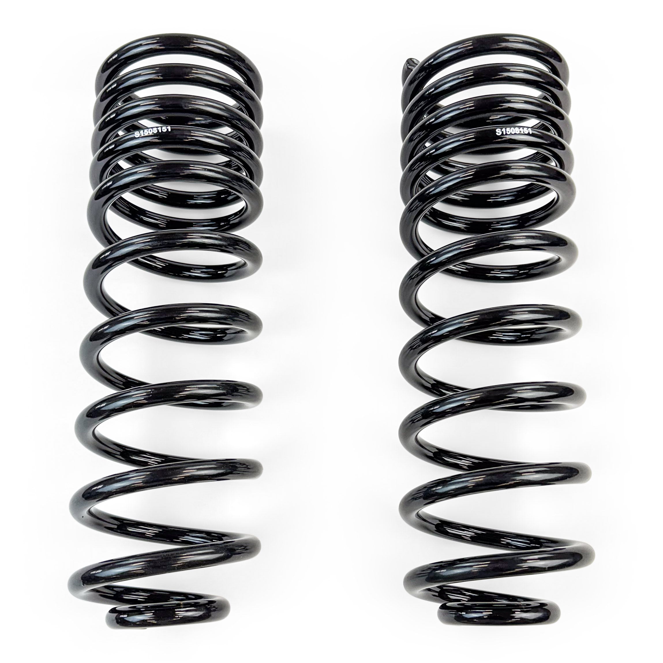 Pair of black coil springs for off-road vehicle suspension on white background