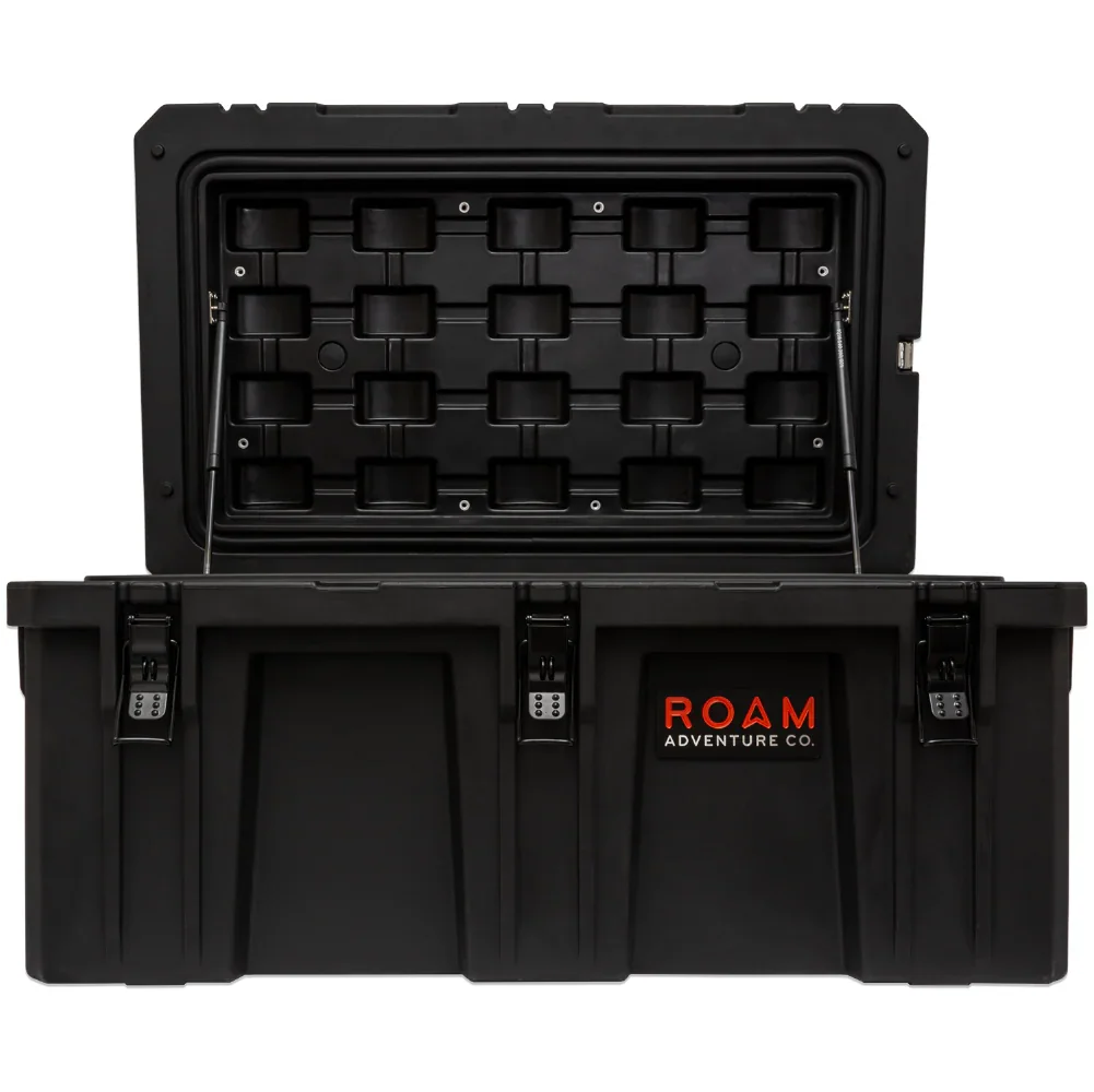 Black heavy-duty storage case with open lid, secure latches, and ROAM Adventure Co. logo for overlanding gear