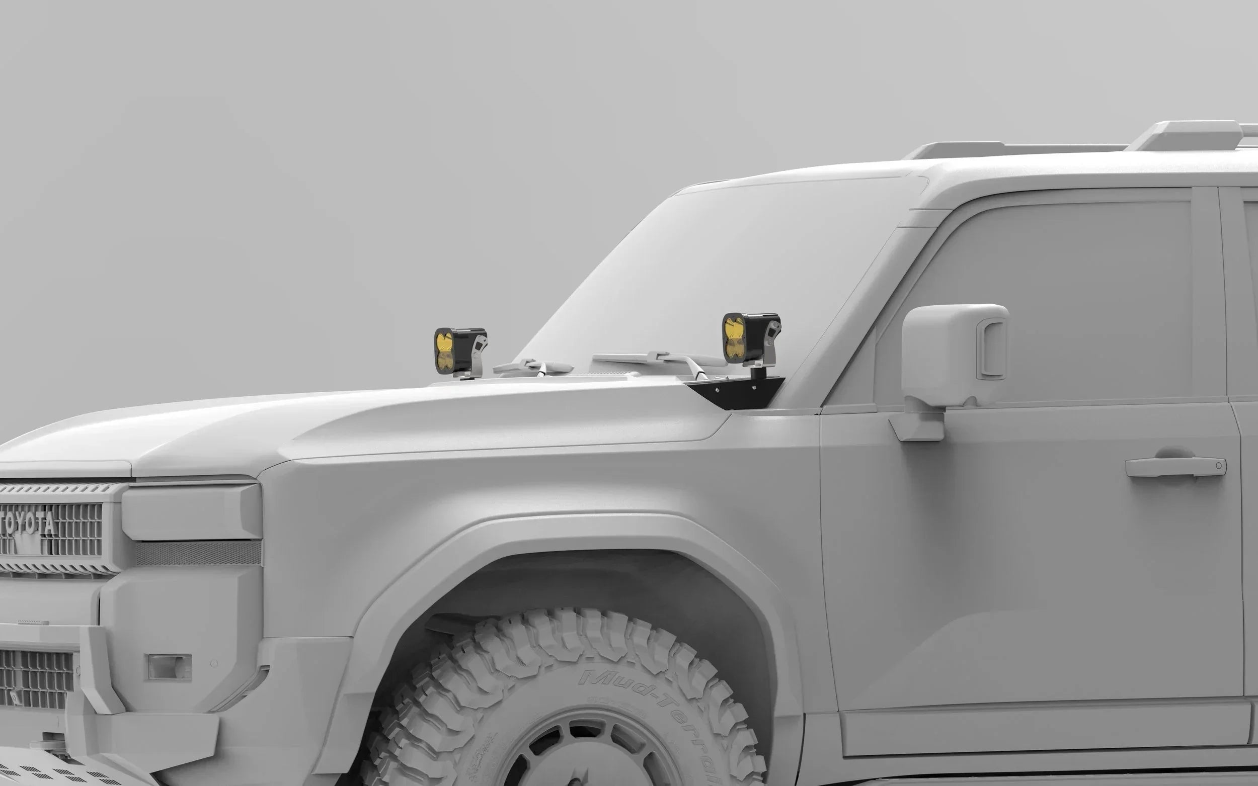 Toyota SUV with off-road hood-mounted LED lights and rugged all-terrain tires