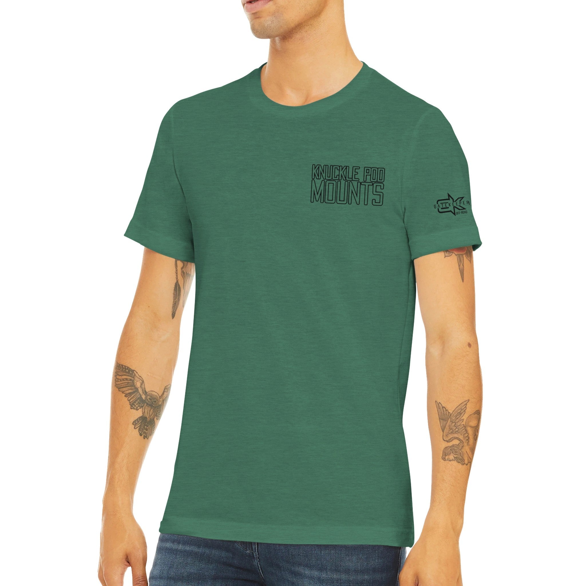 Man wearing green Knuckle Pod Mounts t-shirt with adventure gear sleeve graphic