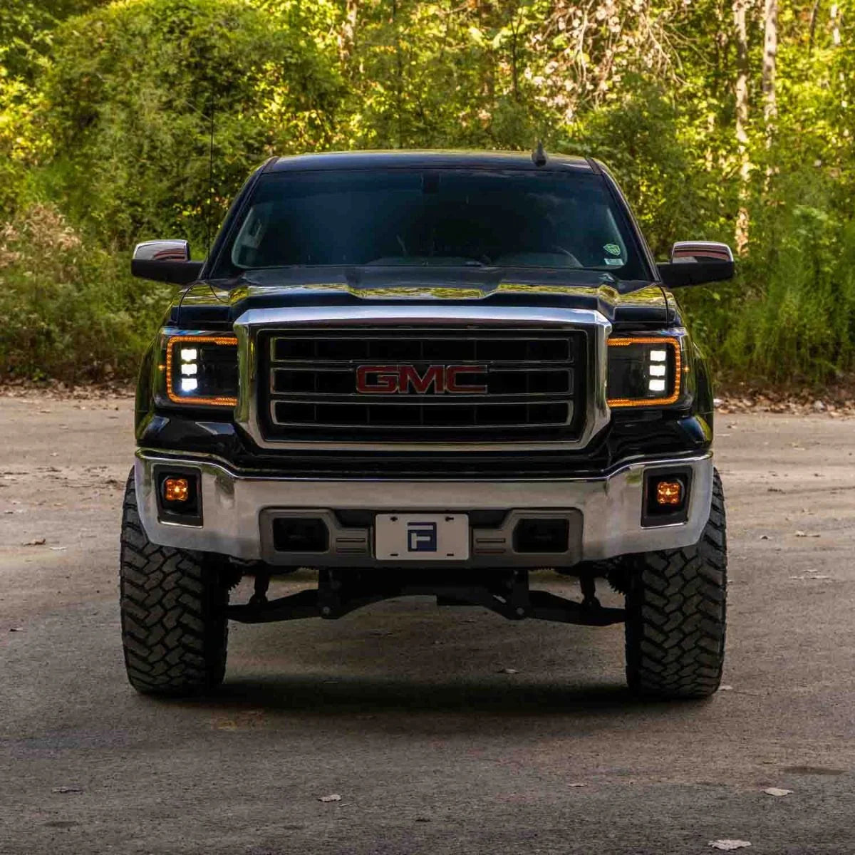 2015 GMC Sierra 1500 custom headlights smoked amber LED, off-road truck front view