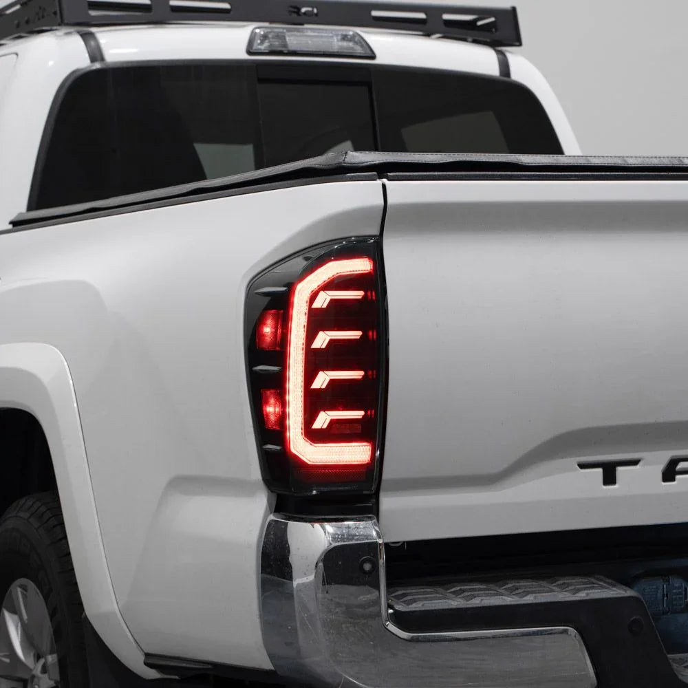 LED tail light on a white Toyota Tacoma pickup, close-up of rear driver side