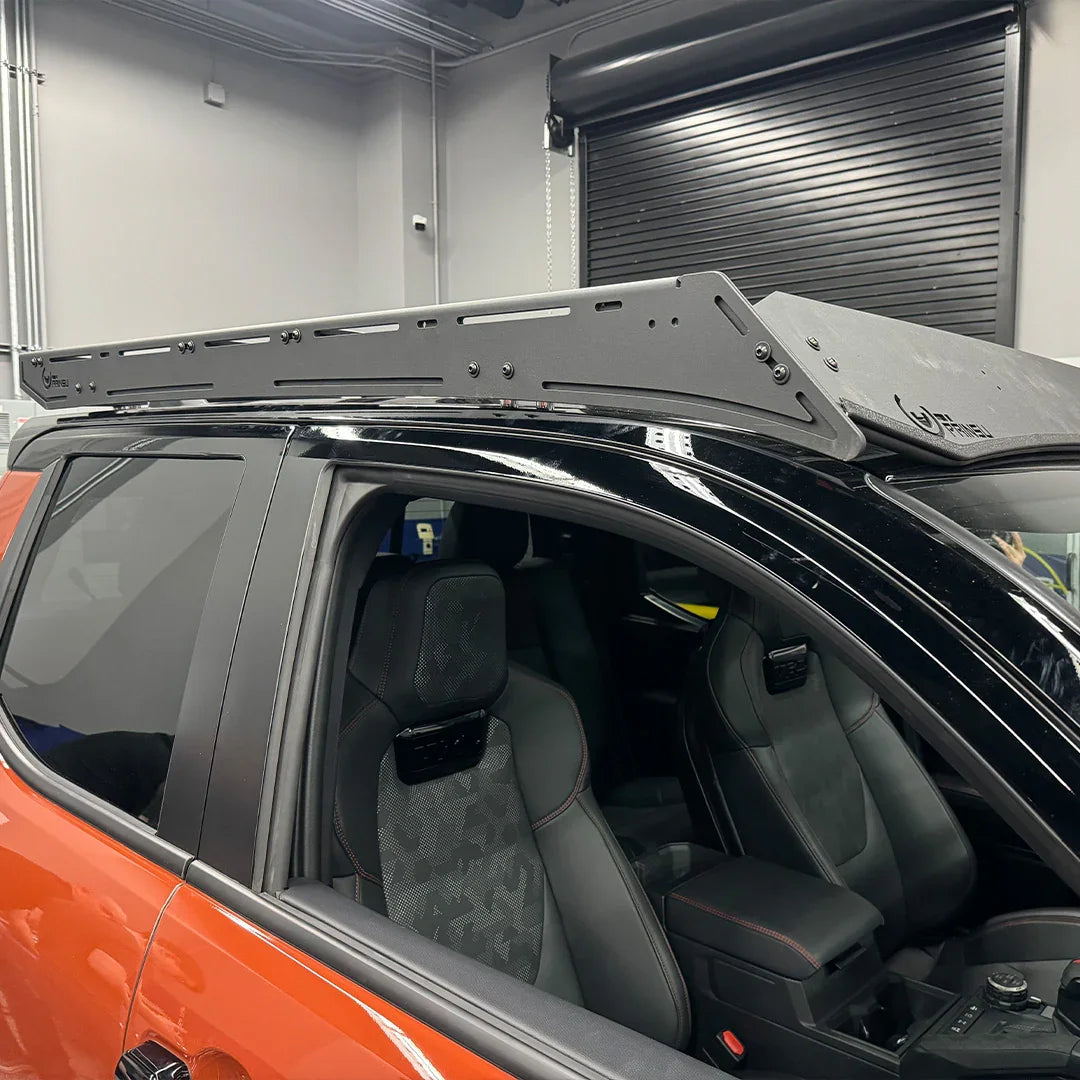 Toyota Tacoma outfitted with TRD roof rack for overlanding and adventure gear