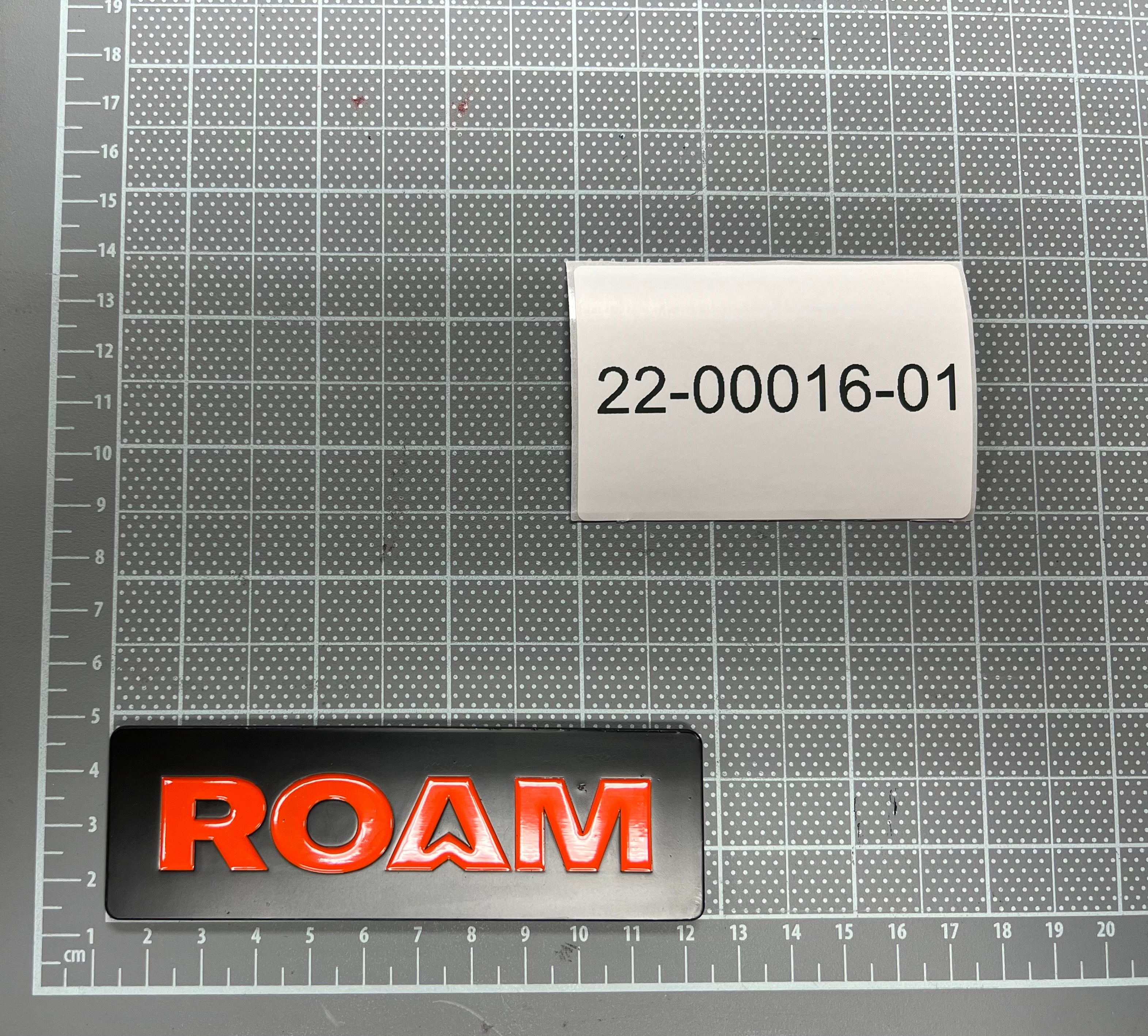 ROAM SPARE PARTS - HF - 22-00016-01 | PLATE, 35X110, V2 ROAM LOGO