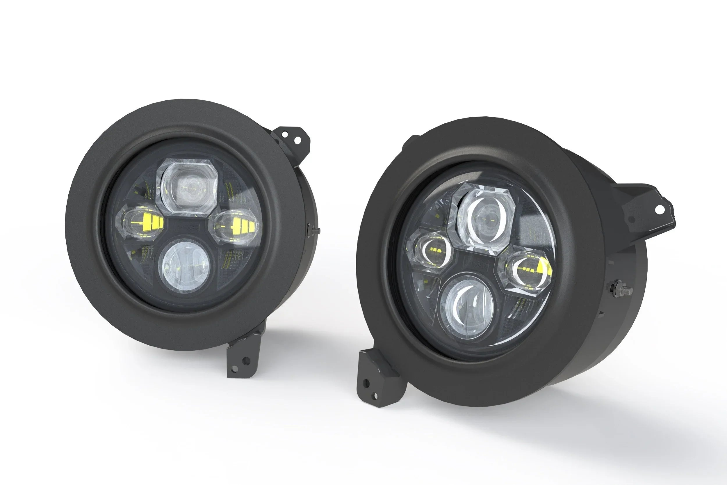 Pair of round 7-inch LED headlight adapters for Jeep Wrangler JL on white background