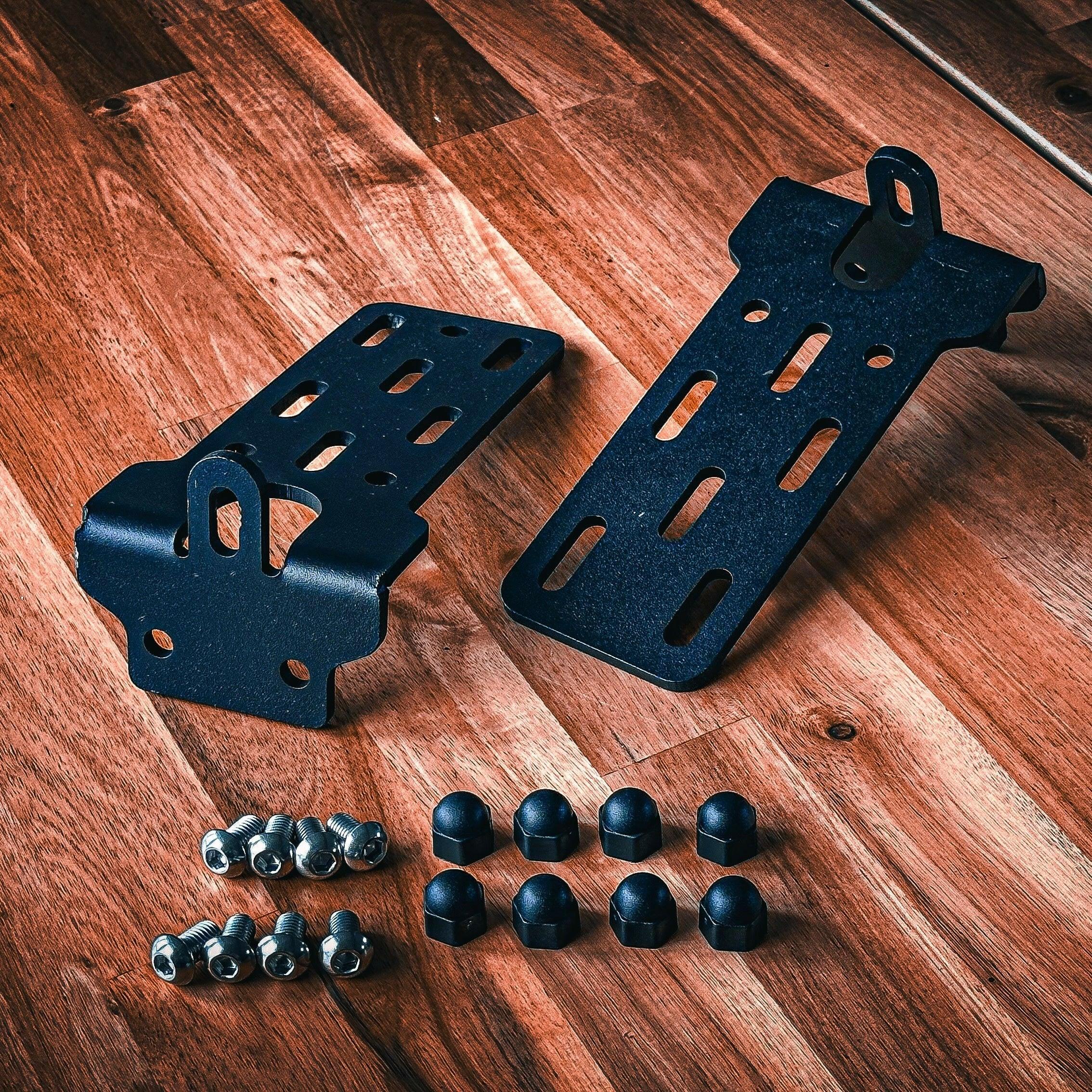 Awning mounting brackets with bolts and caps for roof top crossbars or camper installs