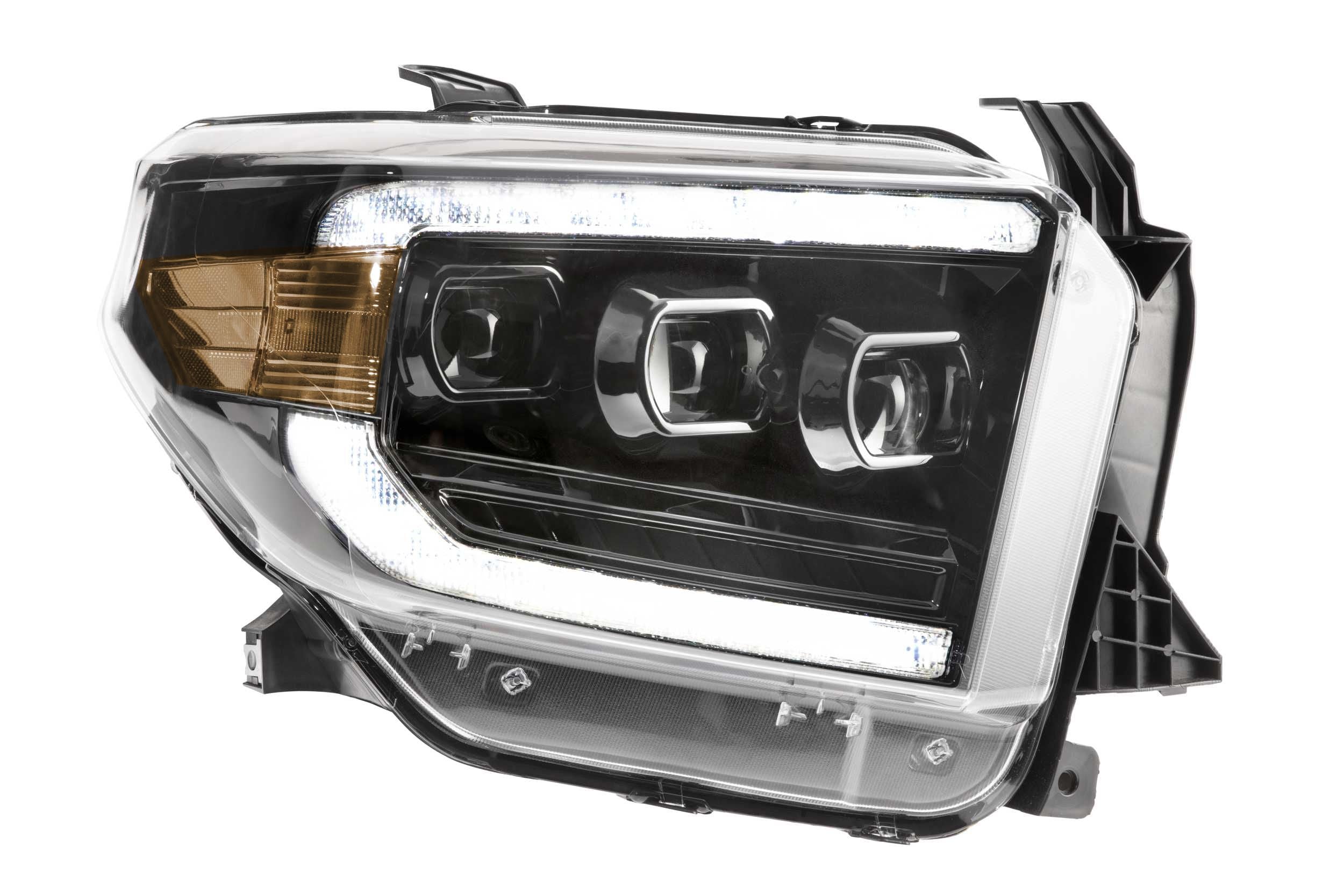 Toyota Tundra LED headlight assembly with clear lens and amber reflector