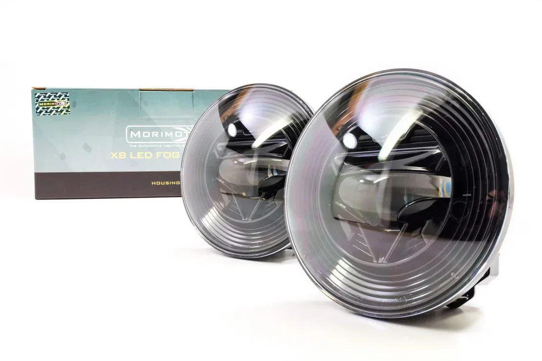 Pair of Morimoto XB LED fog lights for Jeep Wrangler JL with product box on white background