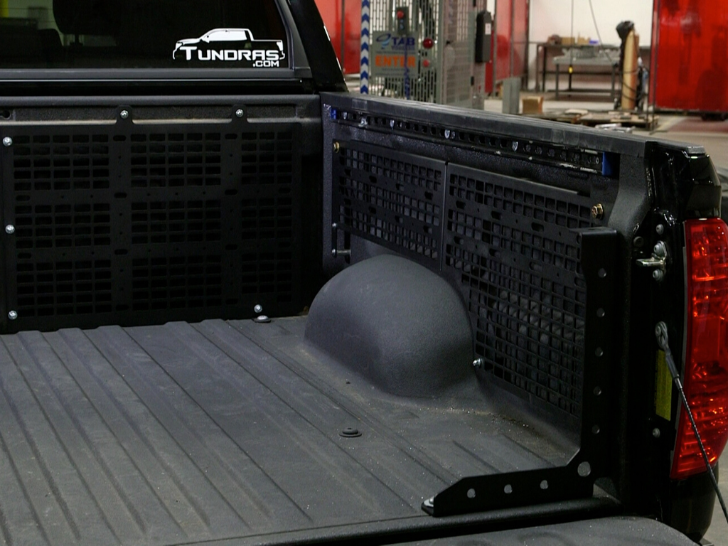 Toyota Tundra truck bed with modular storage panels and off-road gear mounting brackets